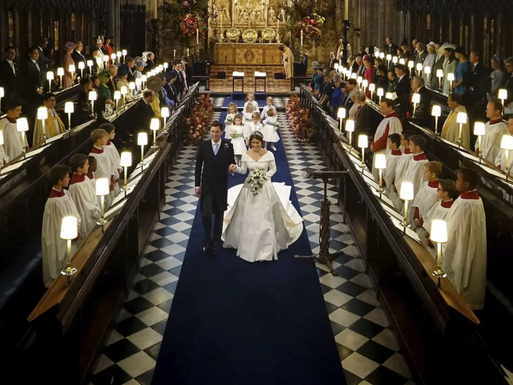 Princess Eugenie of York and Jack Brooksbank after their wedding ceremony at St Georgeâs Chapel, Windsor Castle, near London, England, Friday Oct. 12, 2018.  (Jonathan Brady, Pool via AP)
