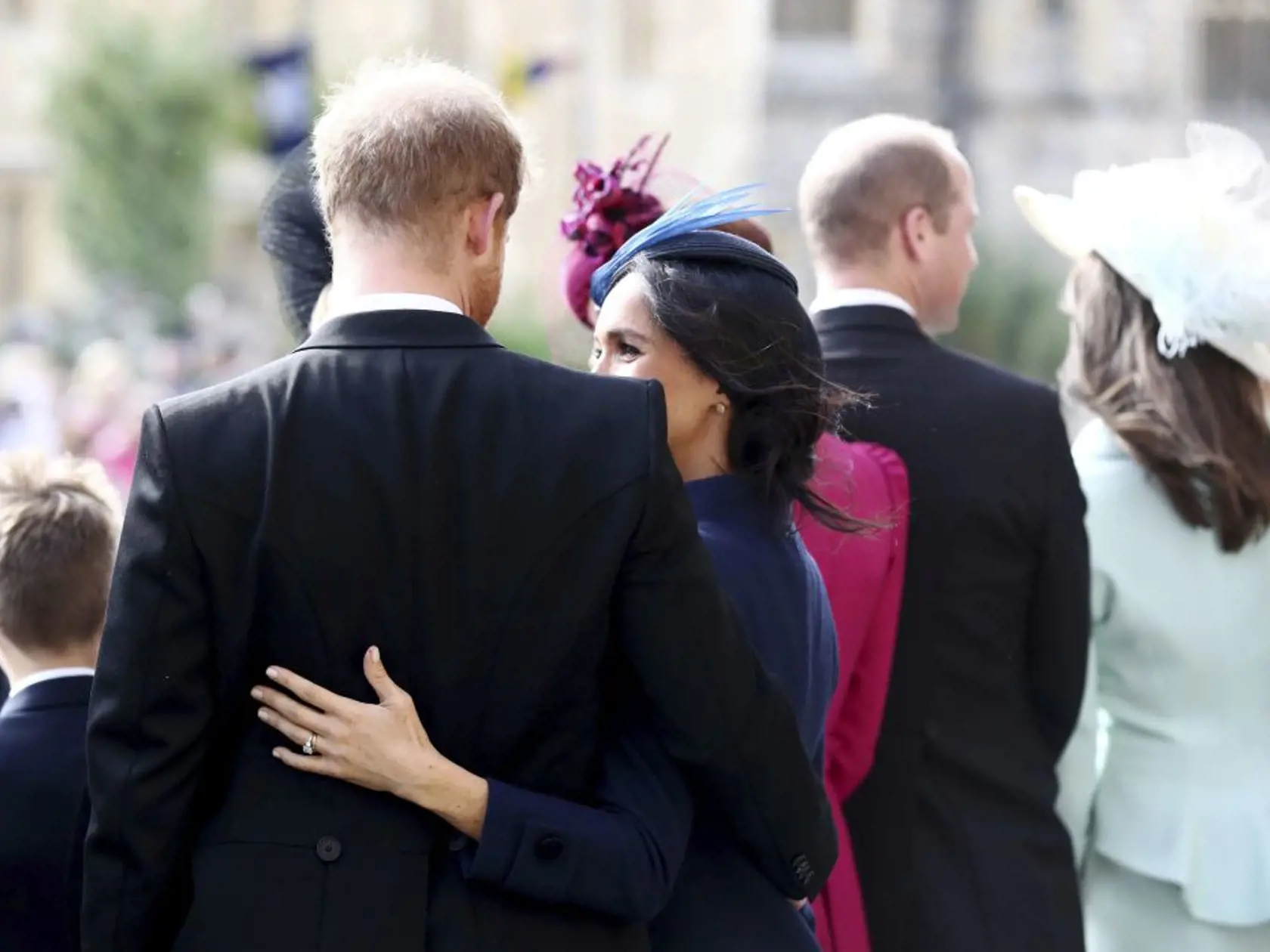 Britain's Prince Harry and Meghan Duchess of Sussex leave after the wedding of Princess Eugenie to Jack Brooksbank at St Georgeâs Chapel, Windsor Castle, near London, England, Friday Oct. 12, 2018. (Gareth Fuller/Pool via AP)