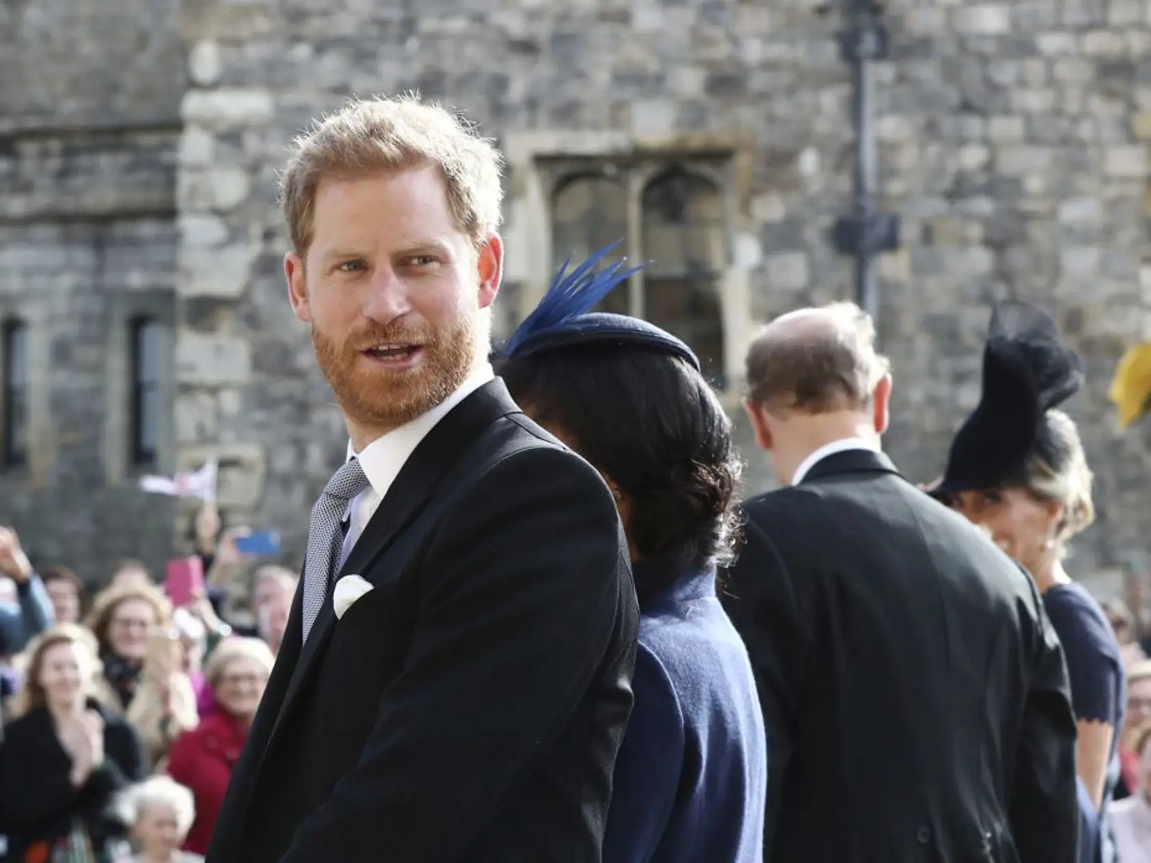 Britain's Prince Harry and Meghan Duchess of Sussex leave after the wedding of Princess Eugenie to Jack Brooksbank at St Georgeâs Chapel, Windsor Castle, near London, England, Friday Oct. 12, 2018. (Gareth Fuller/Pool via AP)