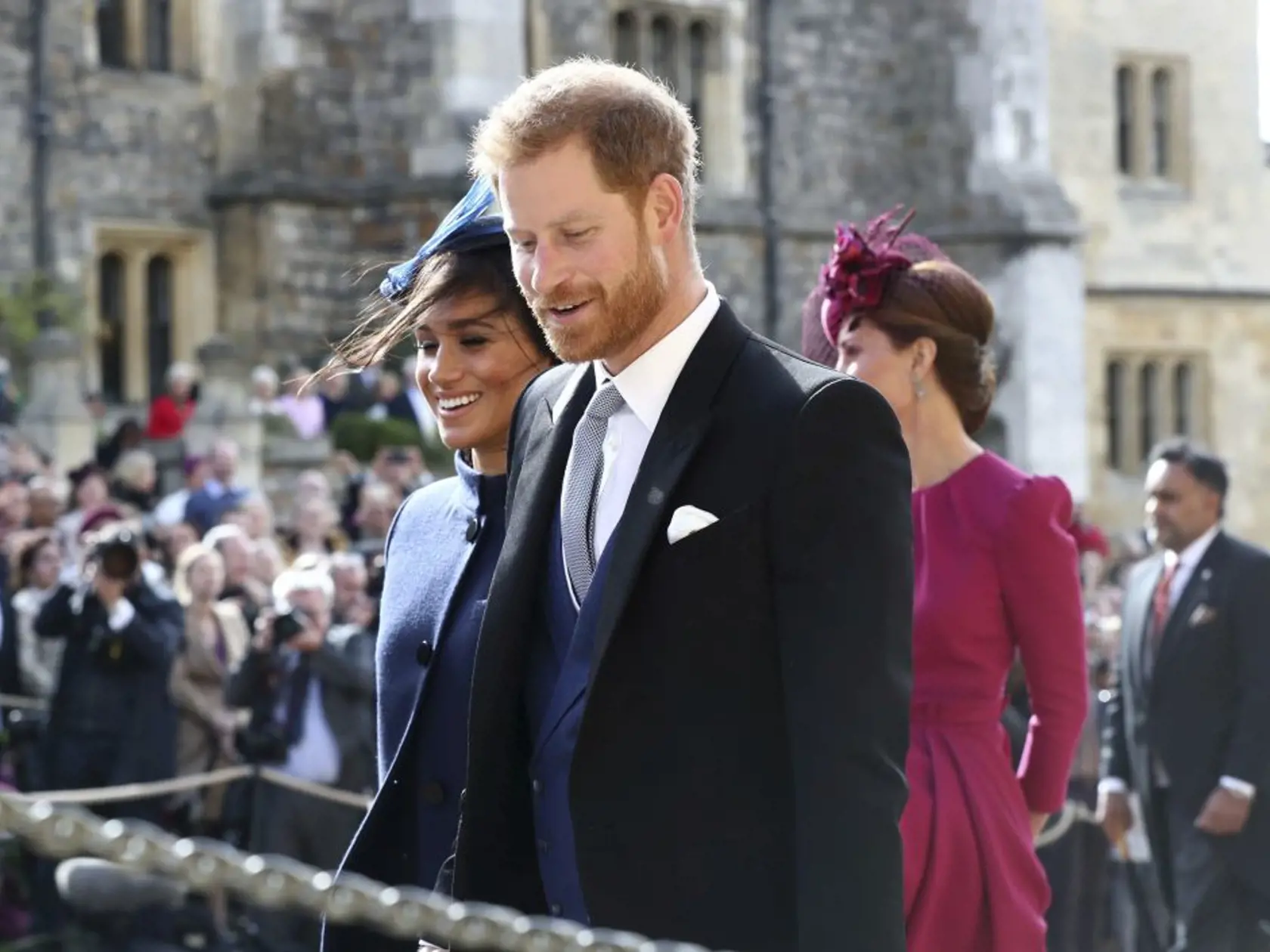 Britain's Prince Harry and Meghan Duchess of Sussex leave after the wedding of Princess Eugenie to Jack Brooksbank at St Georgeâs Chapel, Windsor Castle, near London, England, Friday Oct. 12, 2018. (Gareth Fuller/Pool via AP)