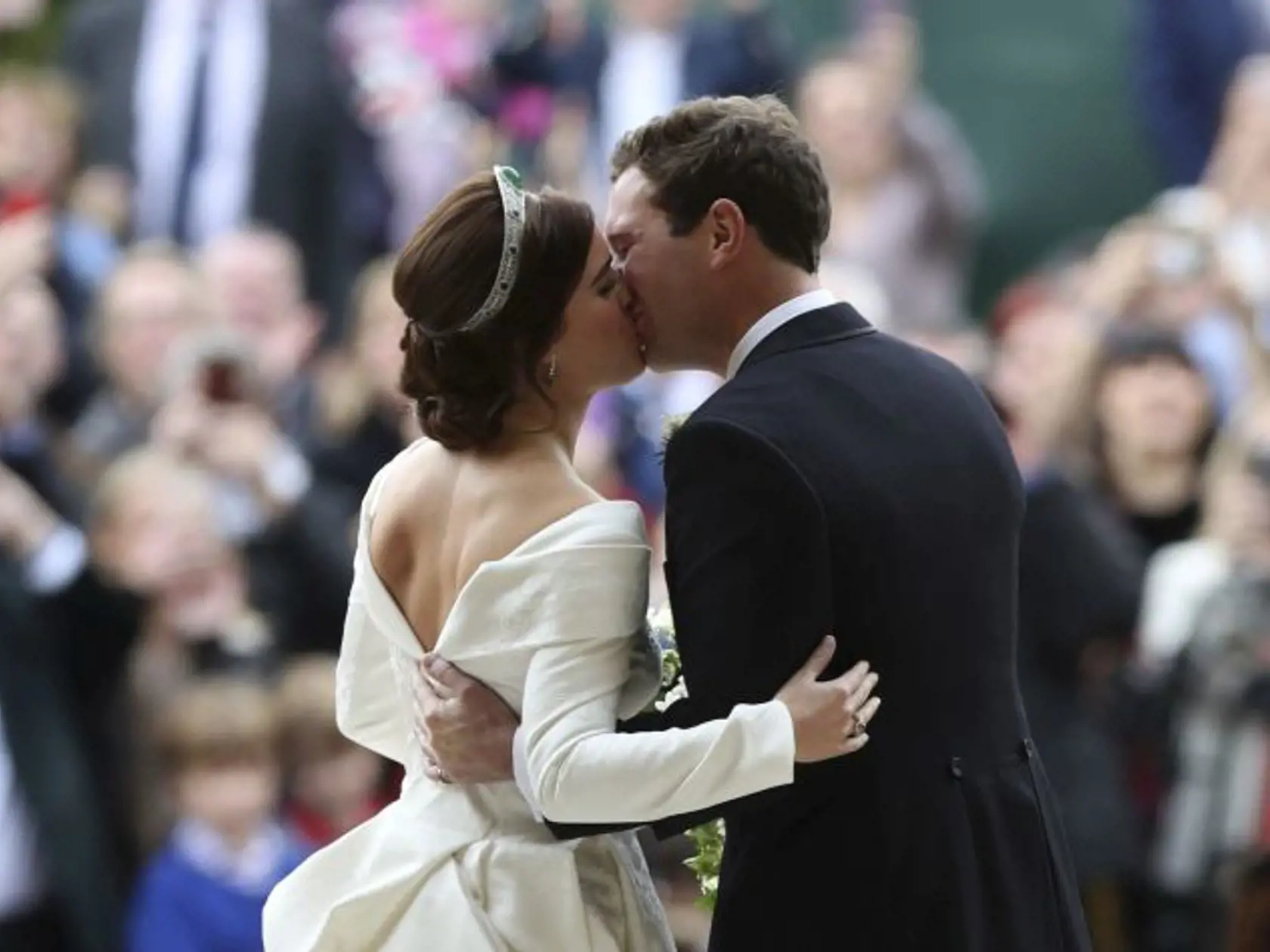 Princess Eugenie of York and Jack Brooksbank kiss after their wedding in St Georgeâs Chapel, Windsor Castle, near London, England, Friday Oct. 12, 2018. (Yui Mok, Pool via AP)