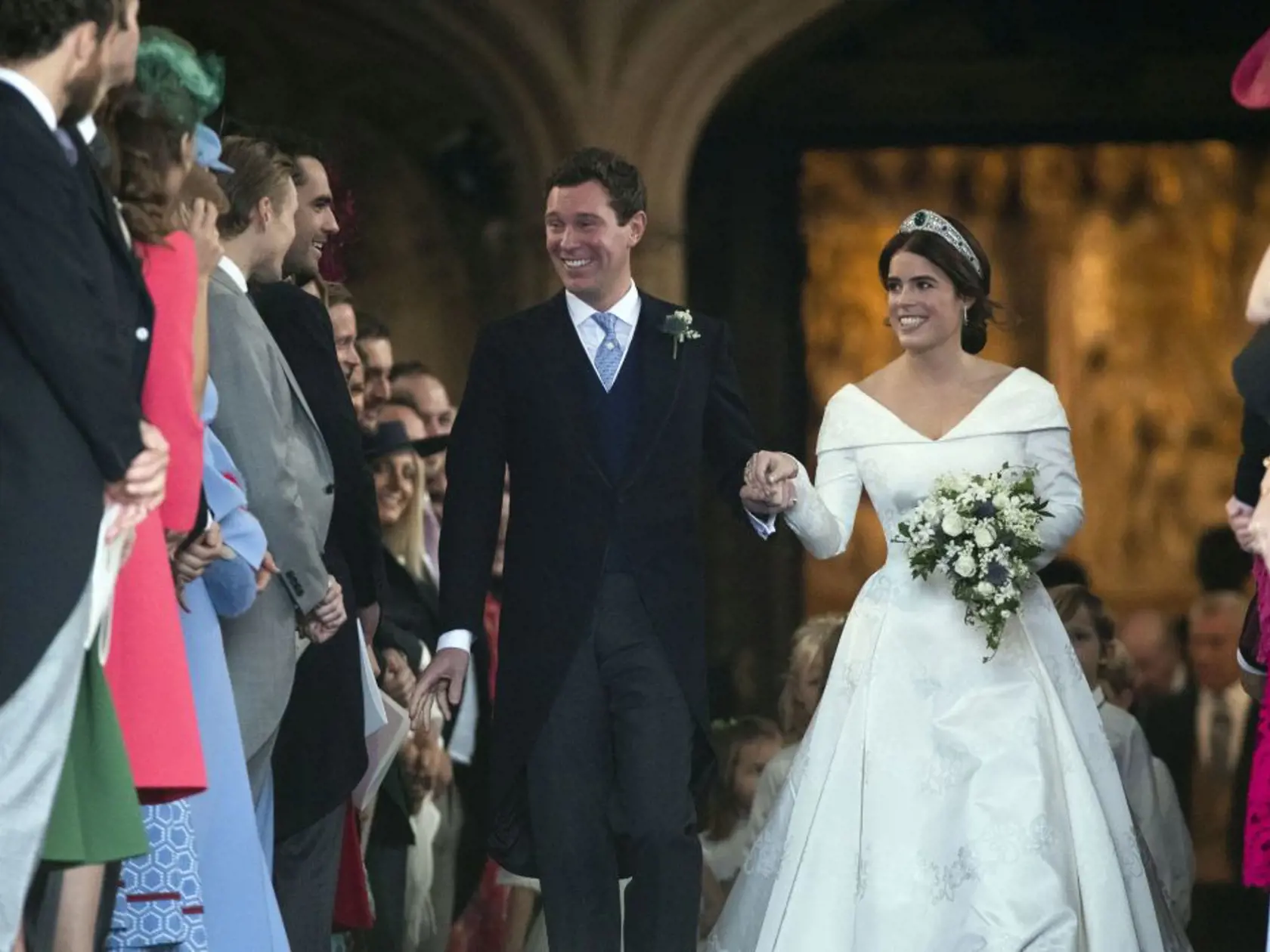Princess Eugenie of York and Jack Brooksbank after their wedding ceremony at St Georgeâs Chapel, Windsor Castle, near London, England, Friday Oct. 12, 2018. (Steve Parsons, Pool via AP)