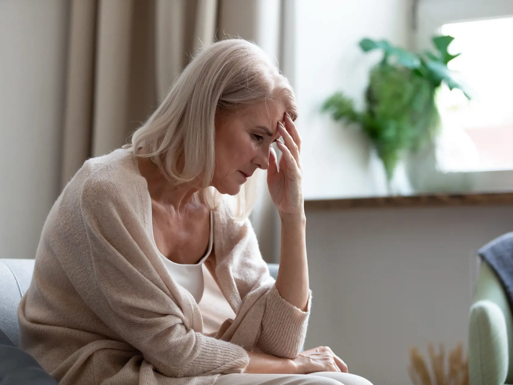 Sad,Depressed,Middle,Aged,Mature,Woman,Sitting,Alone,At,Home