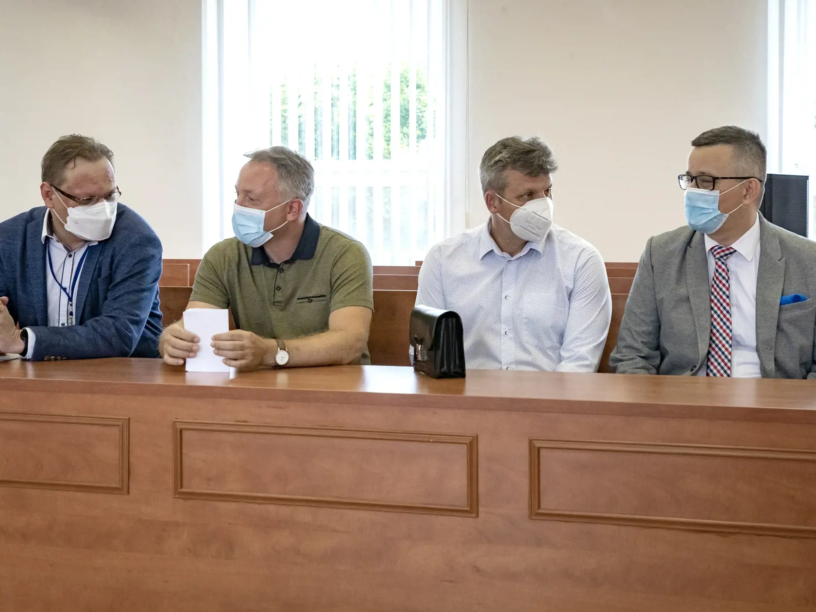 Súdne pojednávanie s bývalým šéfom úradu Špeciálnej prokuratúry Dušanom Kováčikom na  Špecializovanom trestnom súde v Pezinku, ktorý je obžalovaný zo zločinu zneužitia právomoci verejného činiteľa, obzvlášť závažného zločinu prijímania úplatku, zločinu založenia, zosnovania a podporovania zločineckej skupiny a z prečinu ohrozenia dôvernej a vyhradenej skutočnosti. Na snímke sú prokurátori v pozícii svedkov, zľava Juraj Novocký, Bohdan Čelovský, Vasil Špirko a Tomáš Honz.