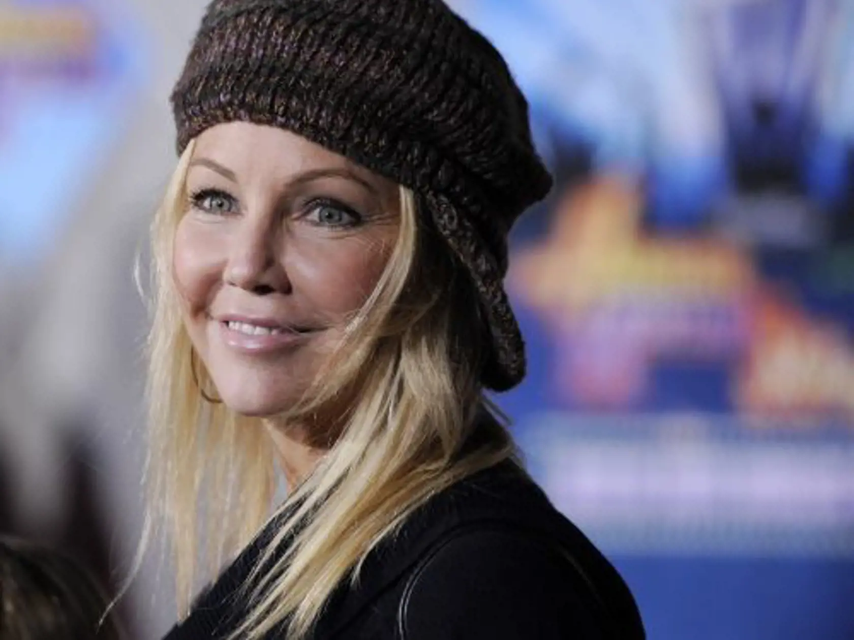 KK6 Los Angeles - Hereèka Heather Locklearová pózujú na svetovej premiére filmu "Hannah Montana & Miley Cyrus:Best of Both Worlds Concert" 17. januára 2008 v Los Angeles. FOTO TASR/AP  Actress Heather Locklear poses at the world premiere of the film "Hannah Montana & Miley Cyrus: Best of Both Worlds Concert" in Los Angeles, Thursday, Jan. 17, 2008. (AP Photo/Chris Pizzello)