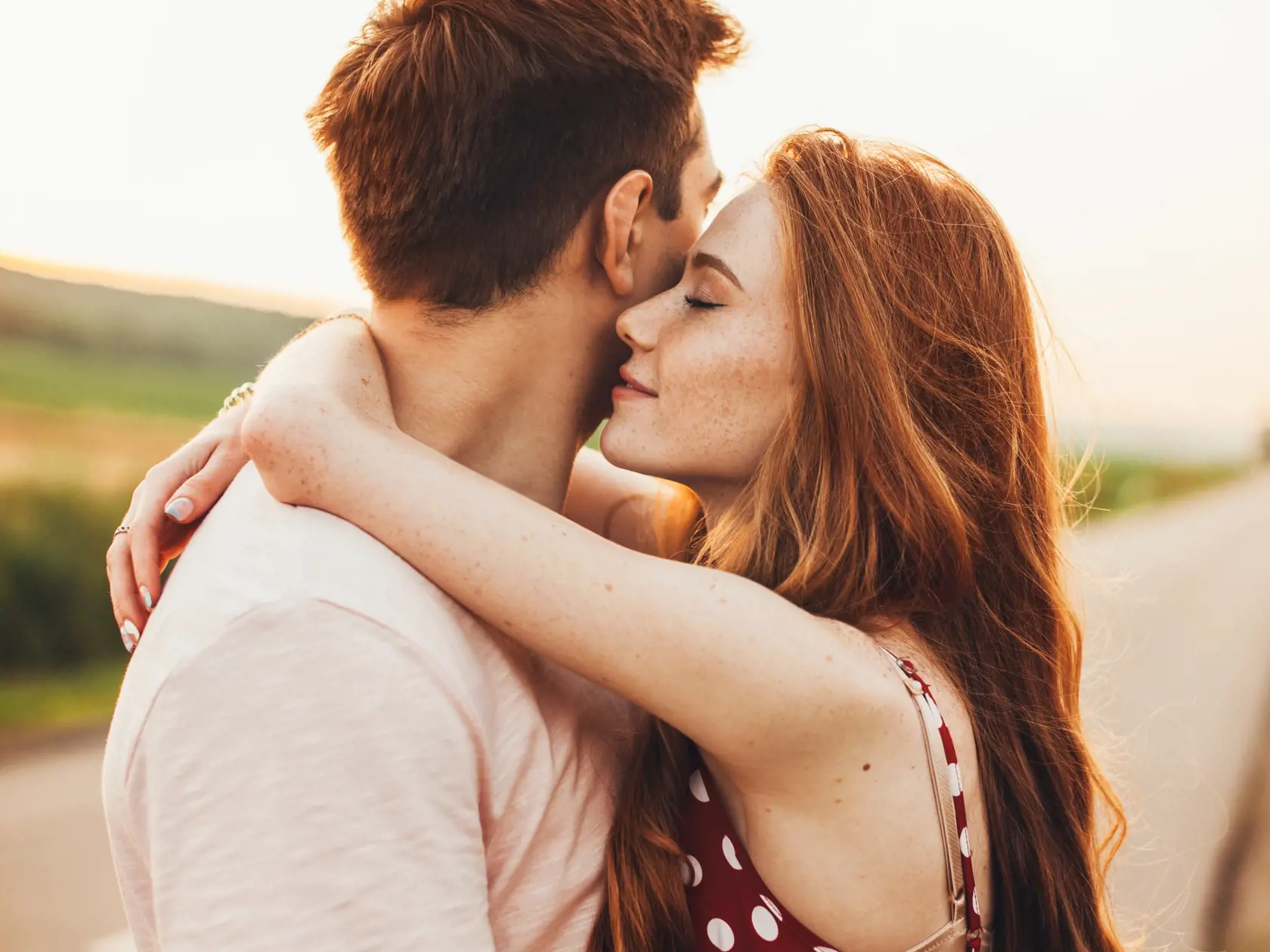 Close-up,Portrait,Of,A,Caucasian,Young,Loving,Couple,Embracing,While