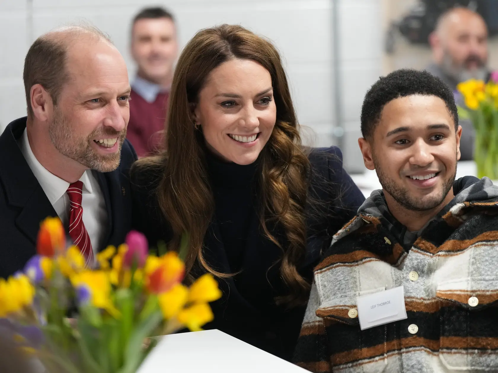 CARDIFF, UNITED KINGDOM - MARCH 15: Britain's Prince William, Prince of Wales, Patron of the Welsh Rugby Union (WRU), and Catherine, Princess of Wales, Patron of the Rugby Football Union (RFU), pose for a photo with Leif Thobroe as they meet injured players who are supported by the Welsh Rugby Charitable Trust as they attend the Six Nations match between Wales and England at the Principality Stadium on March 15, 2025 in Cardiff, Wales.  (Photo by Alastair Grant-WPA Pool/Getty Images)