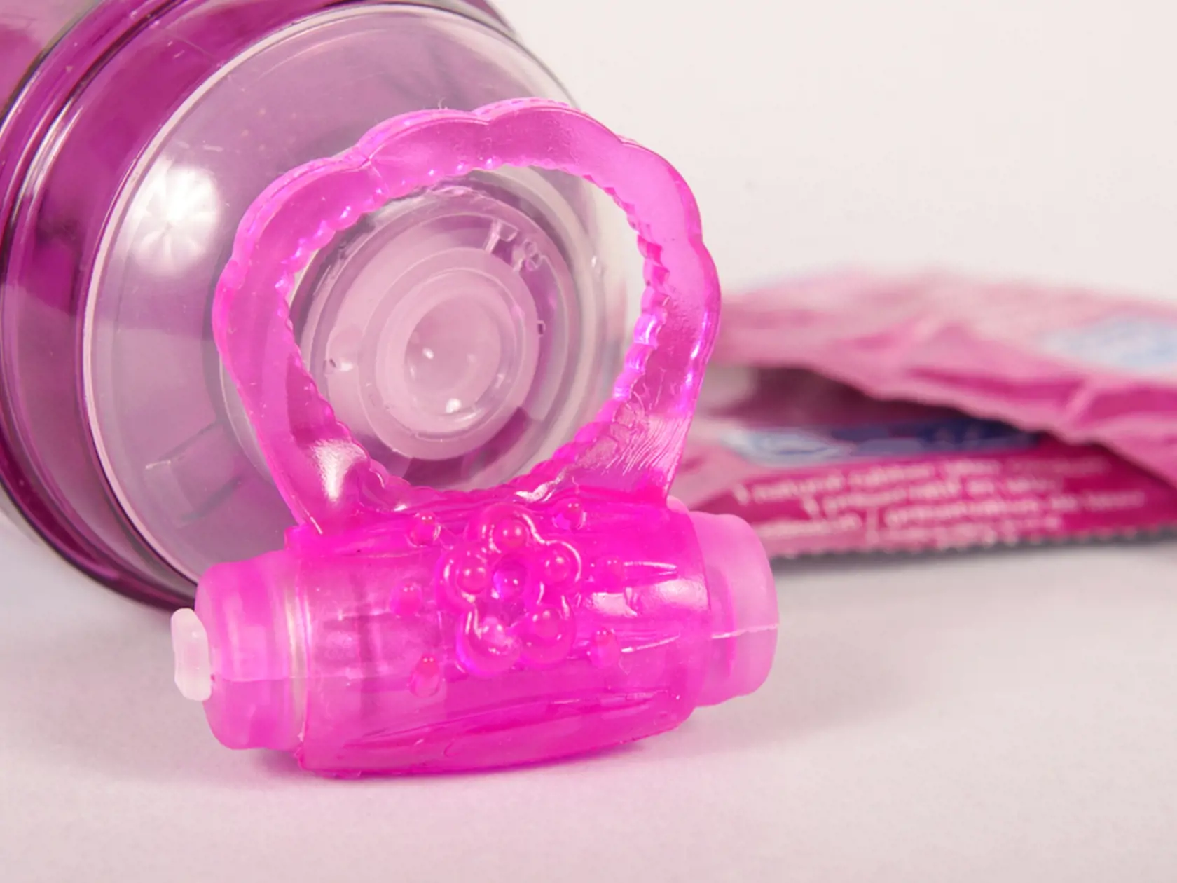 Penis,Ring,And,Condoms,Isolated,On,The,White,Background