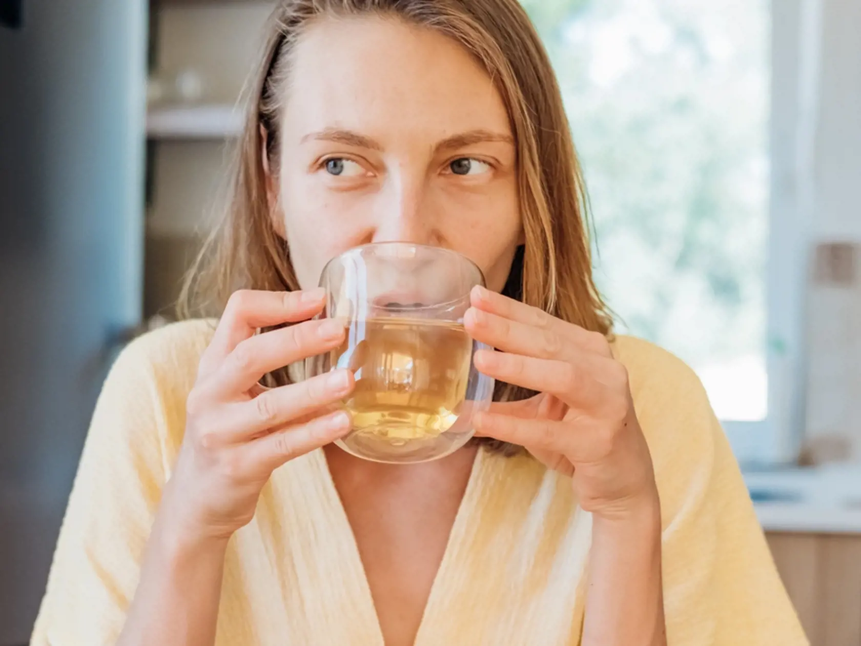Young,Woman,Drinks,Herbal,Green,Tea,At,Home,In,The