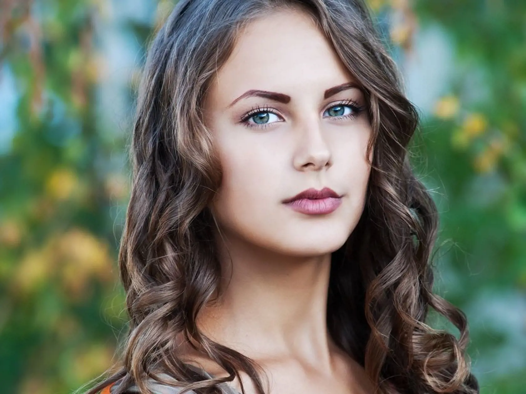 Žena