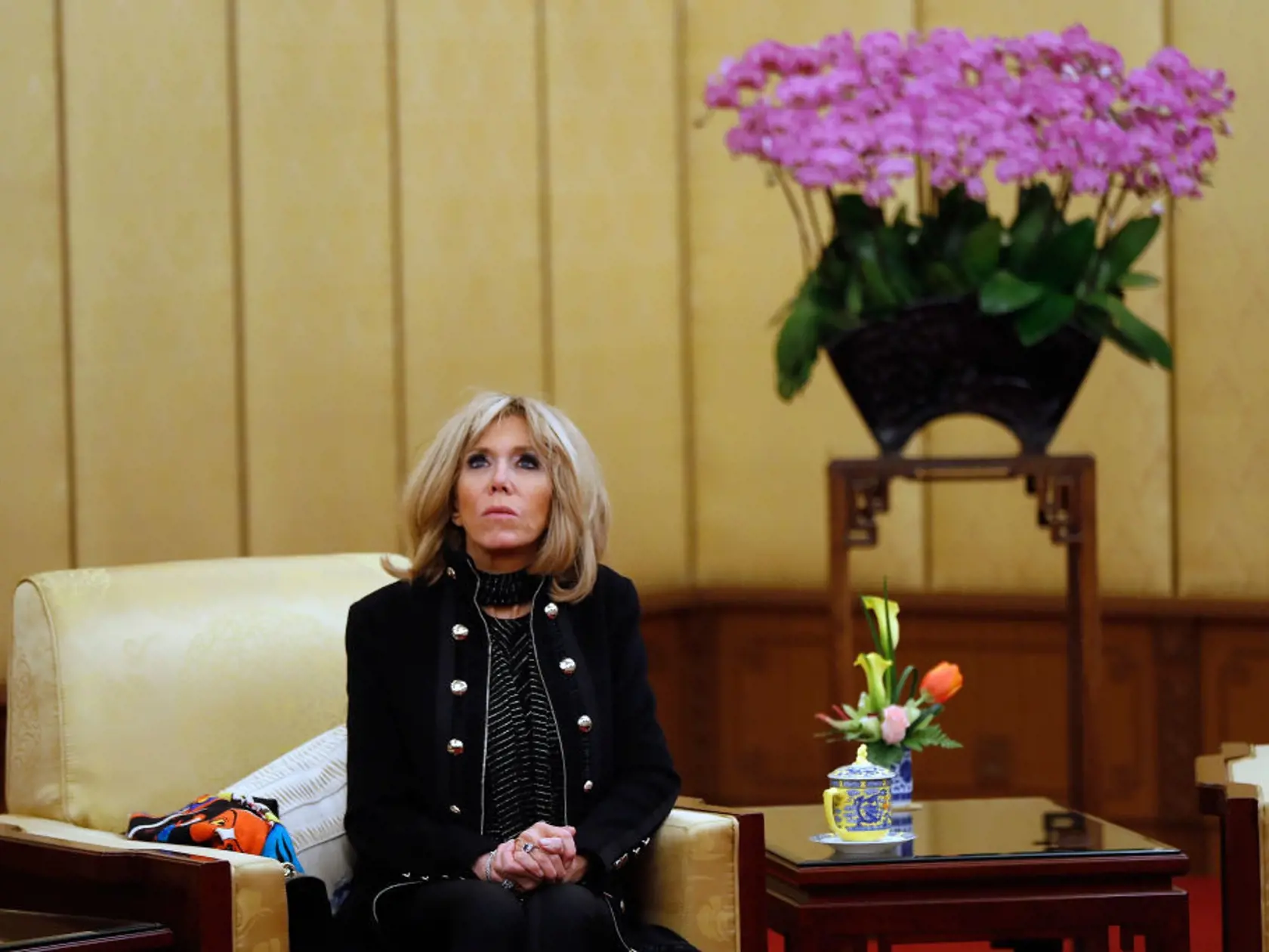 BEIJING, CHINA - JANUARY 8:  Brigitte Macron, wife of French President Emmanuel Macron looks during a meeting of Macron with Chinese President Xi Jinping, at the Diaoyutai State Guesthouse, during their three day state visit on January 8, 2018 in Beijing, China. (Photo by Andy Wong - Pool/Getty Images)