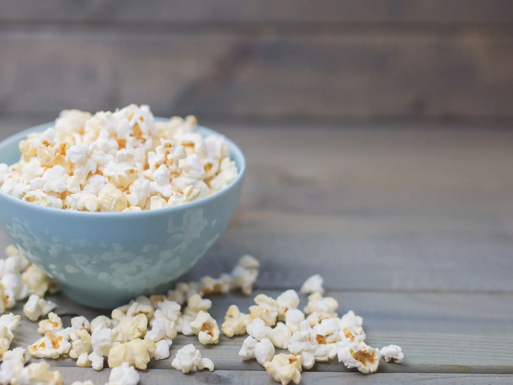 Popcorn in a pastel blue bowl