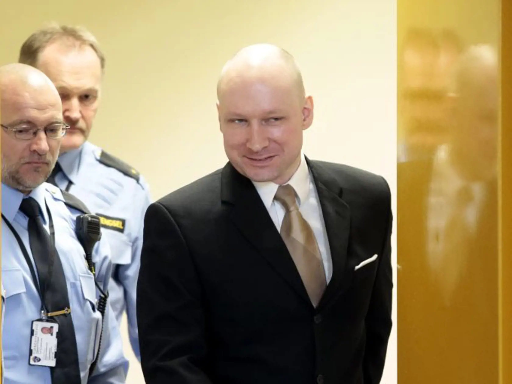 Anders Behring Breivik  enters a courtroom in Skien, Norway, on Tuesday, March 15, 2016. Breivik, the right-wing extremist who killed 77 people in bomb and gun attacks in 2011 arrived in court on Tuesday for his human rights case against the Norwegian government. (Lise Aserud, NTB scanpix via AP)  NORWAY OUT