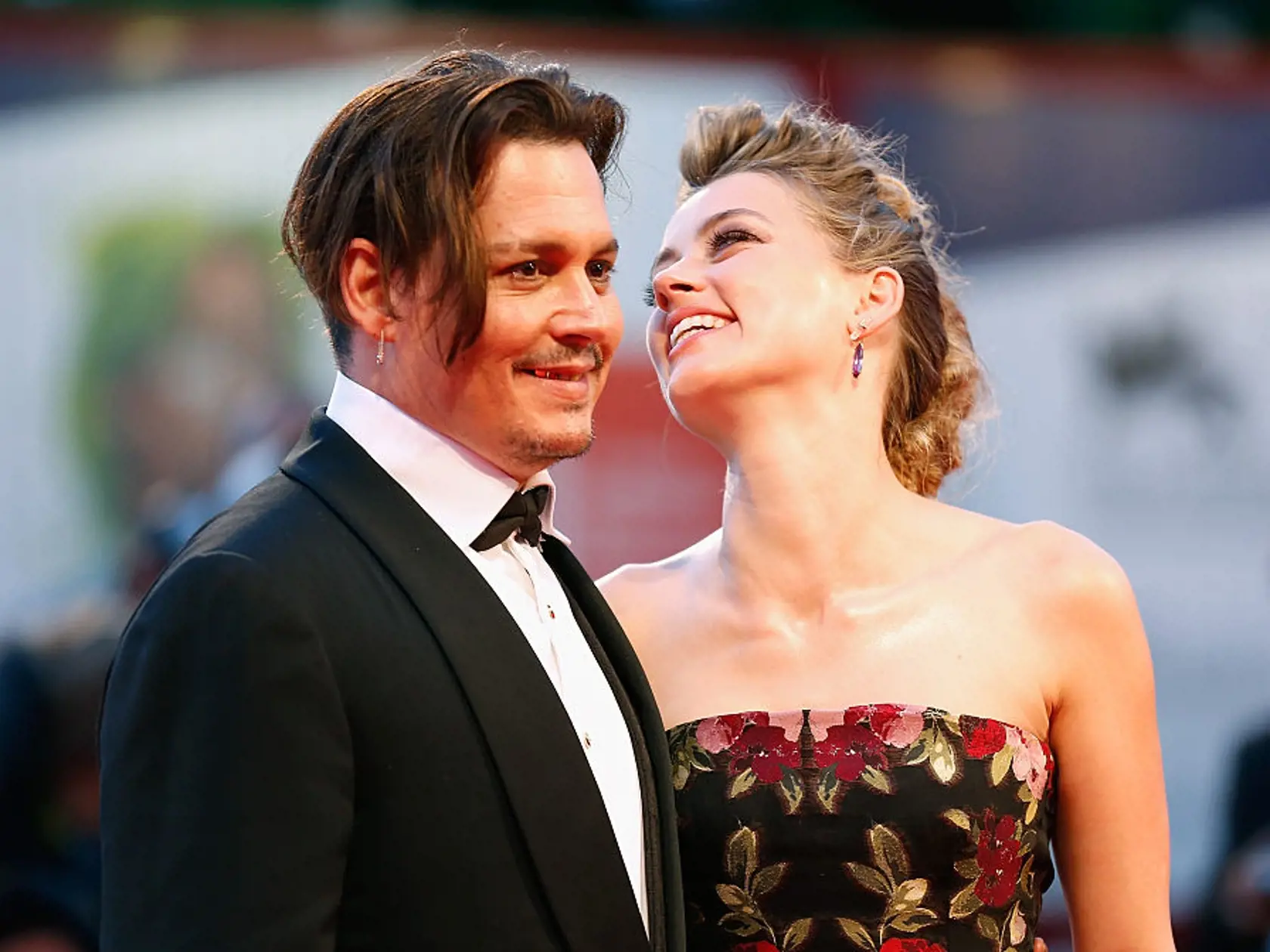 VENICE, ITALY - SEPTEMBER 05:  Johnny Depp and actress Amber Heard attend a premiere for 'The Danish Girl' during the 72nd Venice Film Festival at  on September 5, 2015 in Venice, Italy.  (Photo by Tristan Fewings/Getty Images)