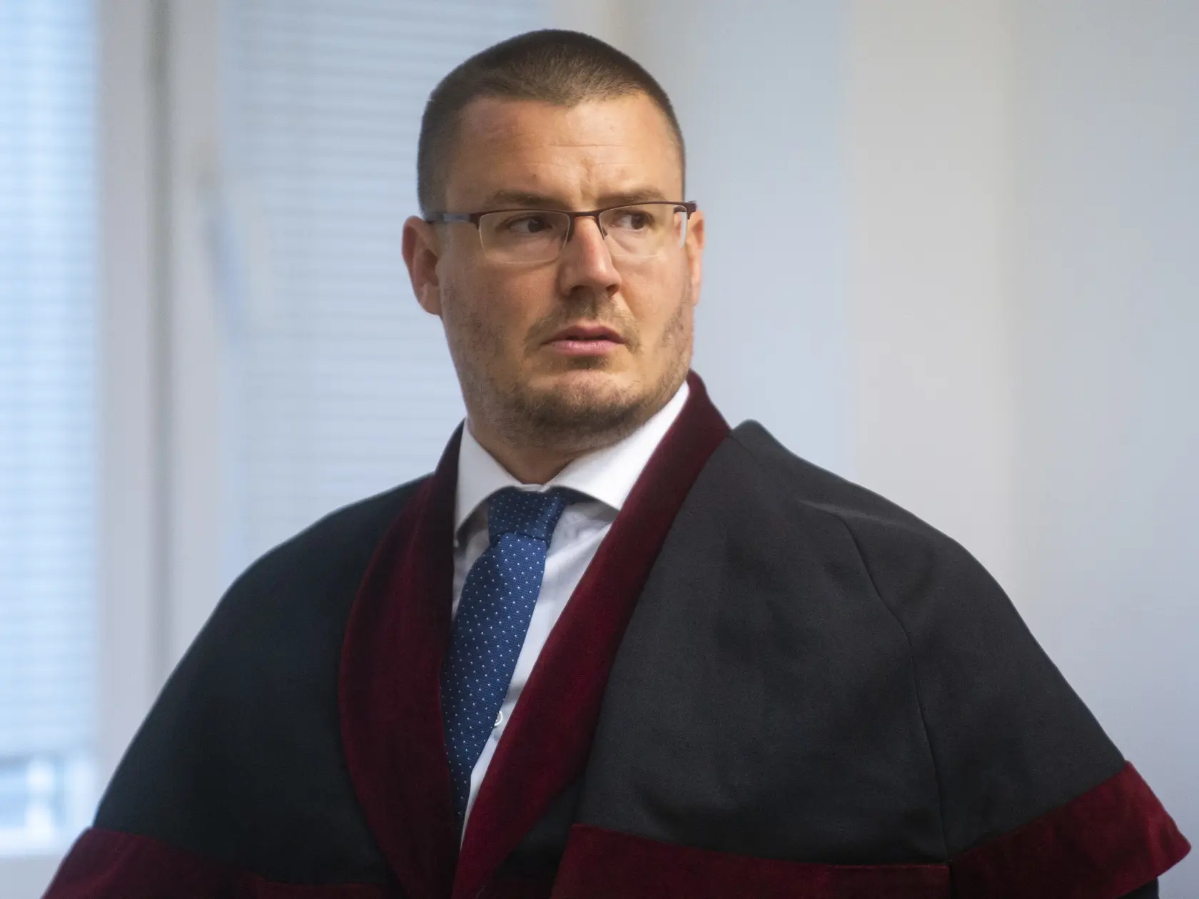 Medzi obvinenými je aj prokurátor Michal Šurek.