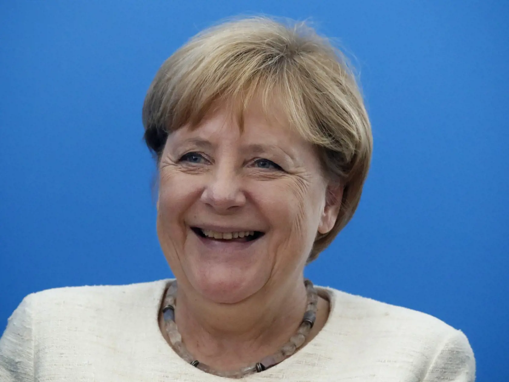 "Zvládneme to," vyhlásila na konci leta roku 2015 bývalá kancelárka Angela Merkelová.