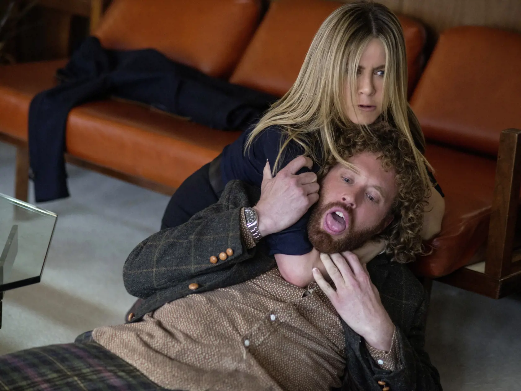 Jennifer Aniston as Carol Vanstone and T.J. Miller as Clay Vanstone in OFFICE CHRISTMAS PARTY by Paramount Pictures, DreamWorks Pictures, and Reliance Entertainment