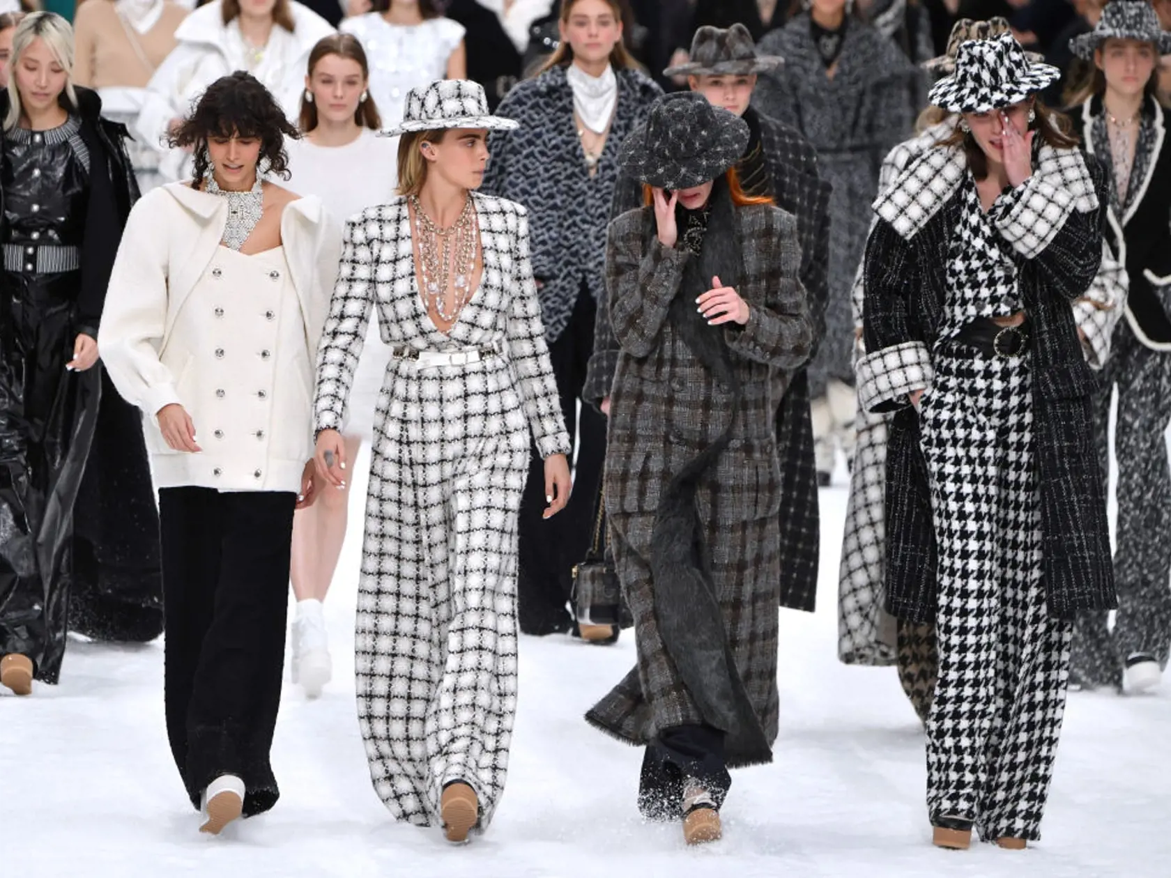 PARIS, FRANCE - MARCH 05: Cara Delevingne (2nd L) and models walk the runway during the finale of the Chanel show as part of the Paris Fashion Week Womenswear Fall/Winter 2019/2020 on March 05, 2019 in Paris, France. (Photo by Pascal Le Segretain/Getty Images)