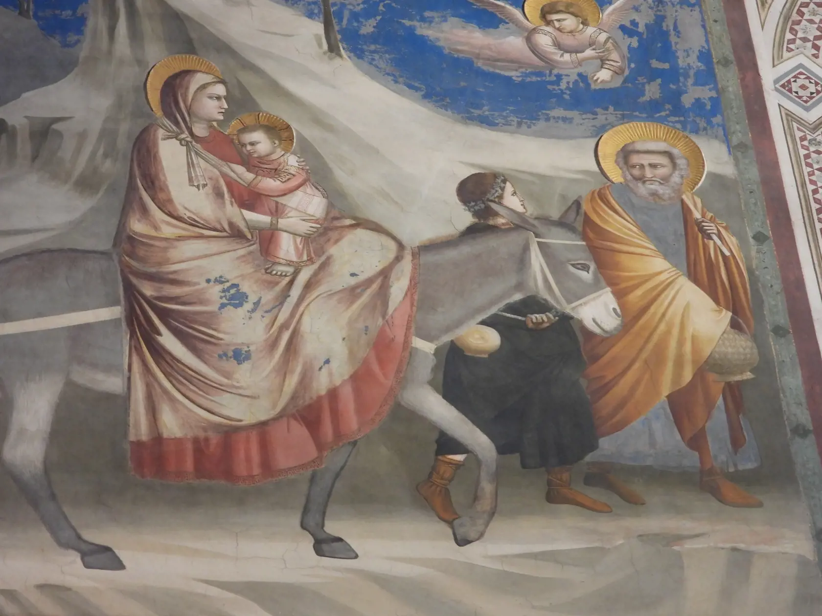 Freska Útek Svätej rodiny do Egypta z Kaplnky Scroveginovcov v Padove. Autorom maľby je taliansky maliar Giotto di Bondone