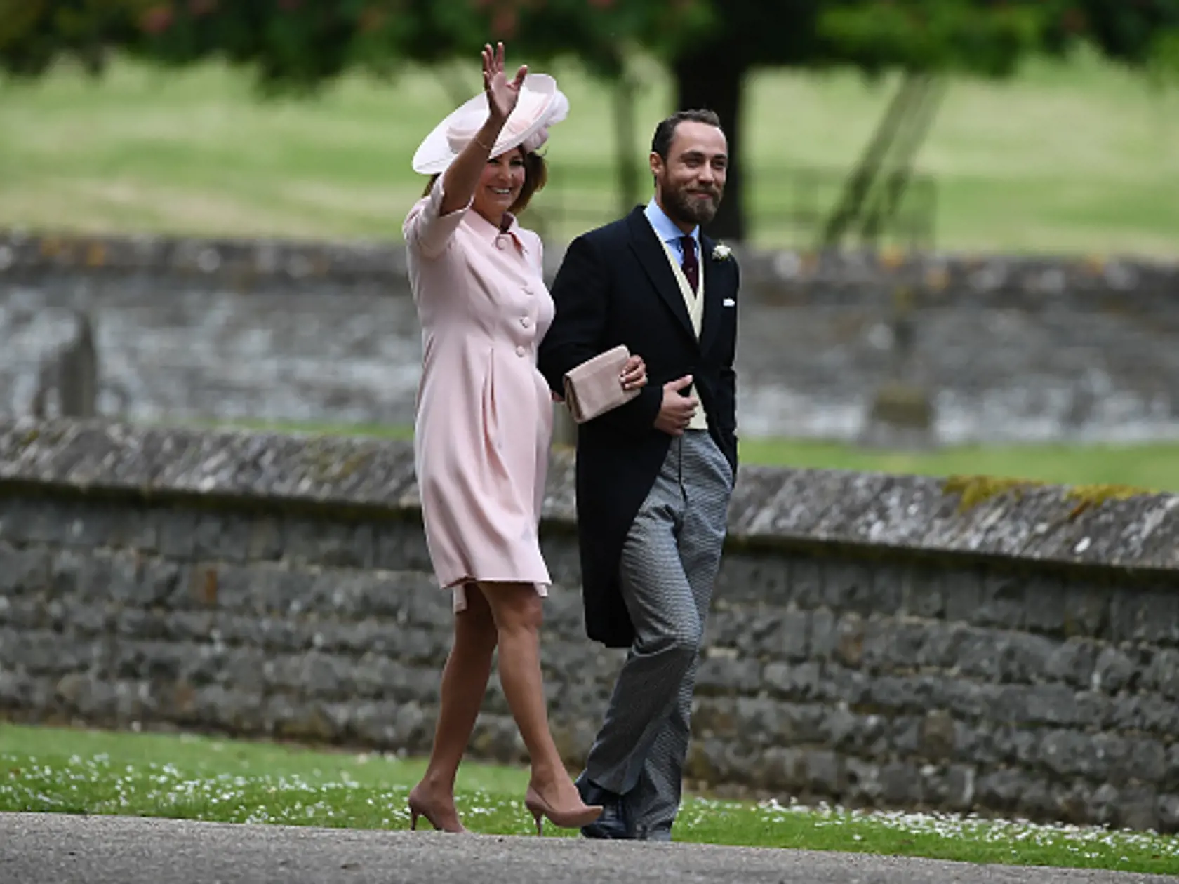 ENGLEFIELD GREEN, ENGLAND - MAY 20:  Carole Middleton, Pippa's mother and James Middleton, Pippa's brother attend the wedding of Pippa Middleton and James Matthews at St Mark's Church on May 20, 2017 in Englefield Green, England.  (Photo by Justin Tallis - WPA Pool/Getty Images)