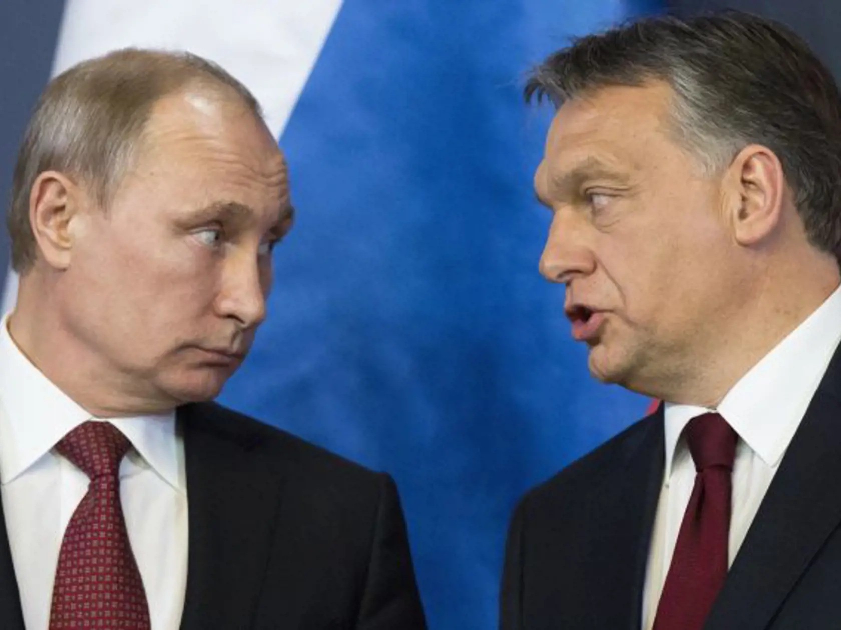 Russian President Vladimir Putin, left, listens to Hungarian Prime Minister Viktor Orban during a signing ceremony at the parliament building in Budapest, Hungary, Tuesday, Feb. 17, 2015. (AP Photo/Alexander Zemlianichenko)