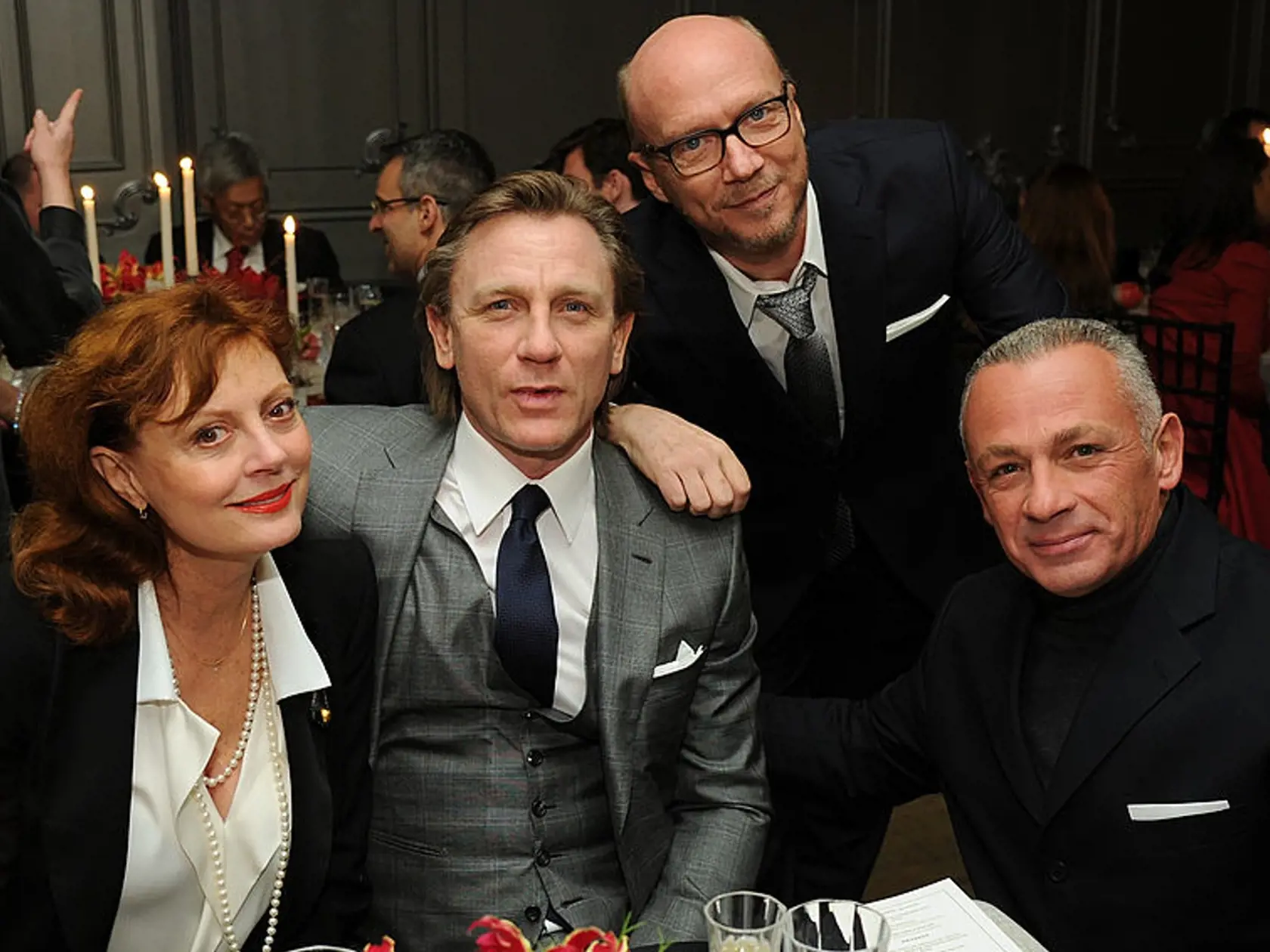 Režisér Paul Haggis a vľavo od neho herci Susan Sarandon a Daniel Craig