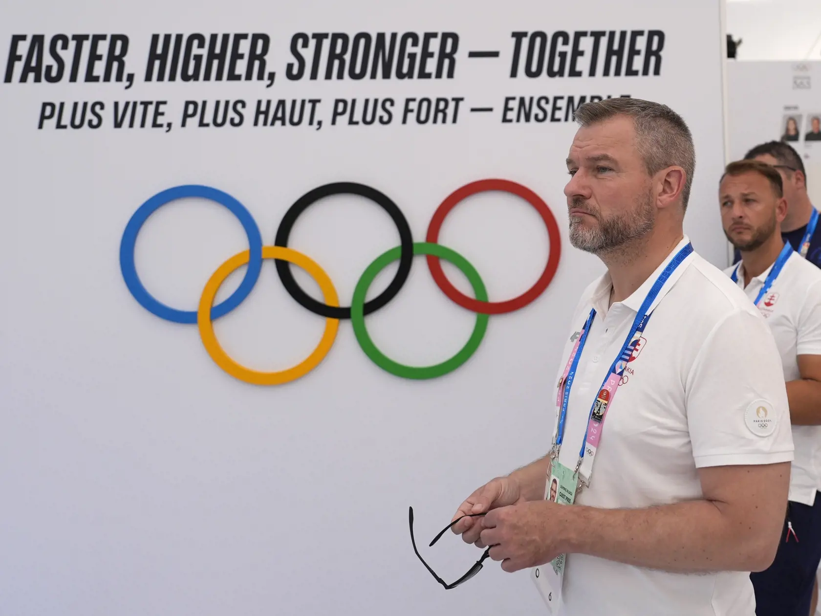 Na snímke zľava slovenský prezident Peter Pellegrini a minister vnútra SR Matúš Šutaj Eštok počas návštevy olympijskej dediny na XXXIII. letných olympijských hrách v nedeľu 29. júla 2024 v Paríži.