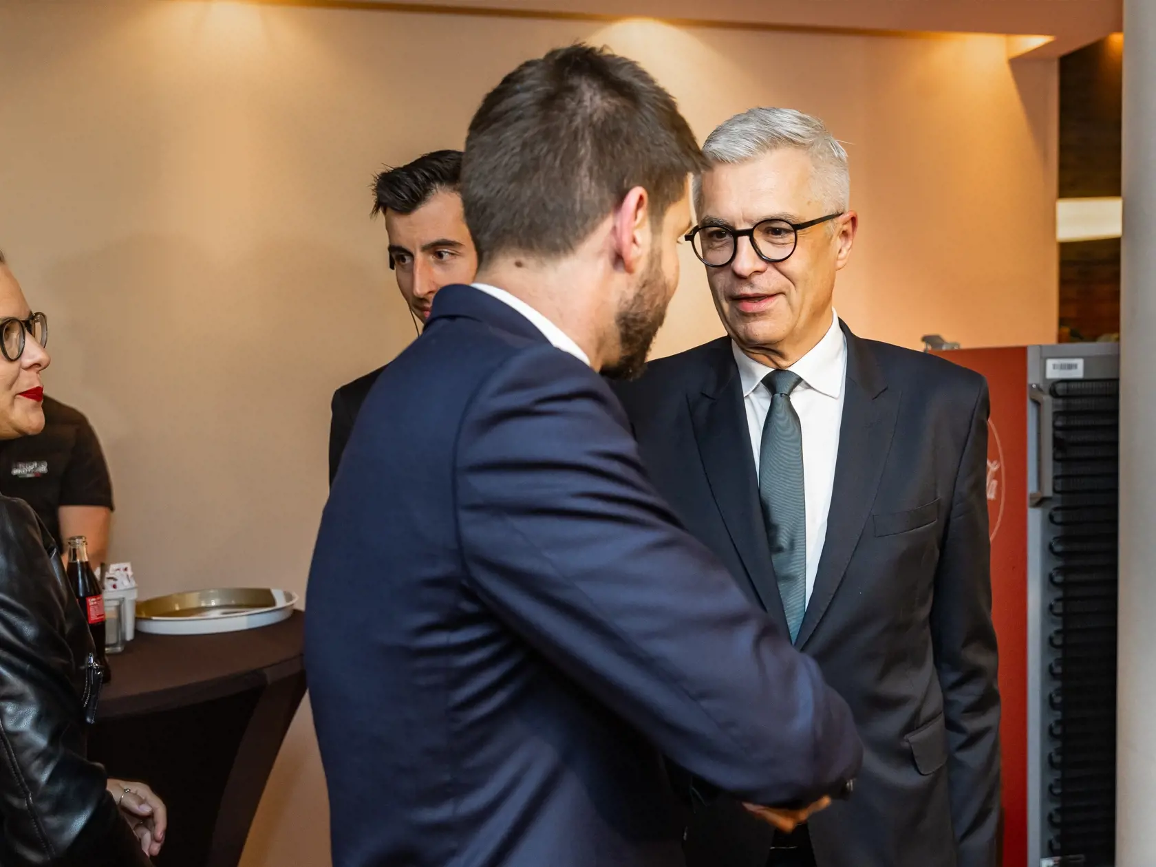 Príchod prezidentského kandidáta Ivana Korčoka do volebnej centrály v Bratislave. Na snímke Ivan Korčok, Michal Šimečka a Kristína Tormová.
