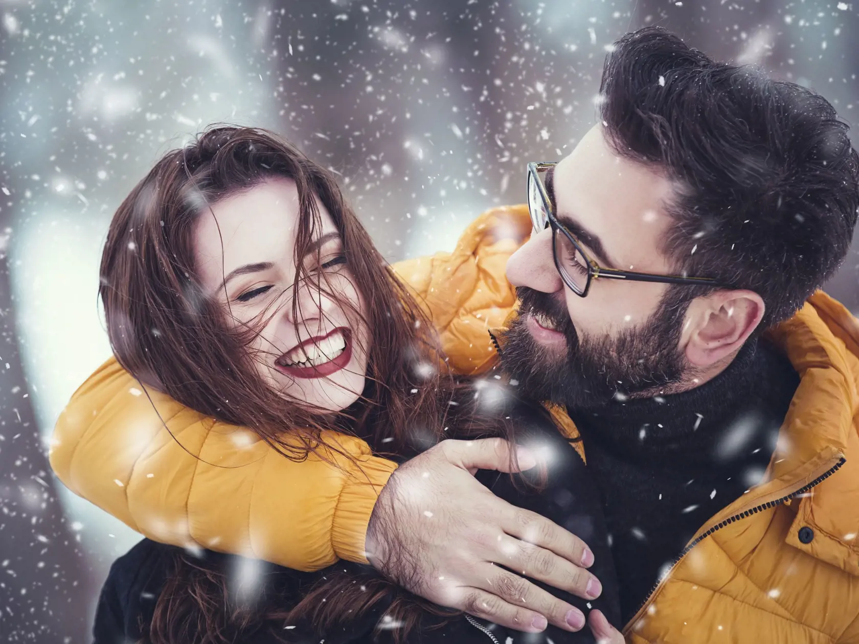 Romantic Lovely Couple Having Fun In A Snowy Park