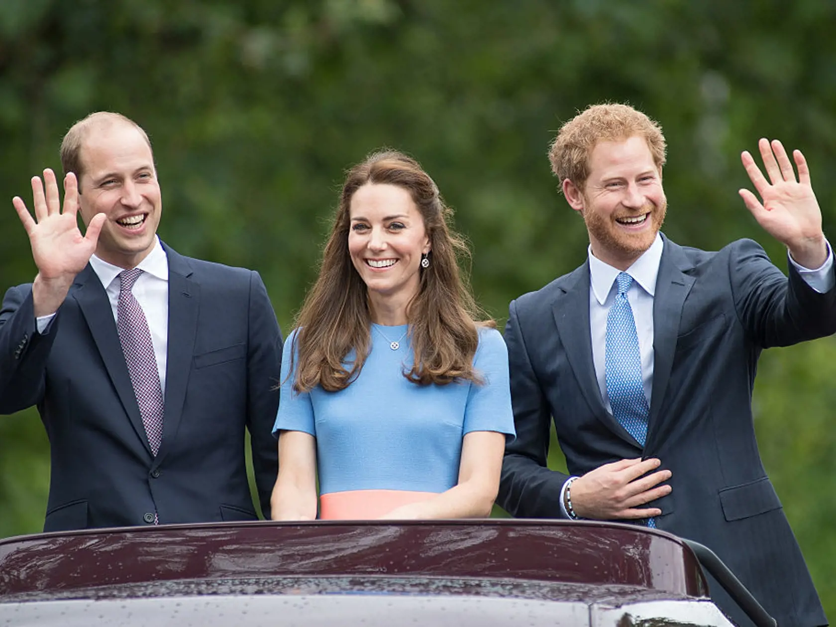 Princ William, vojvodkyňa Kate Middleton a princ Harry.