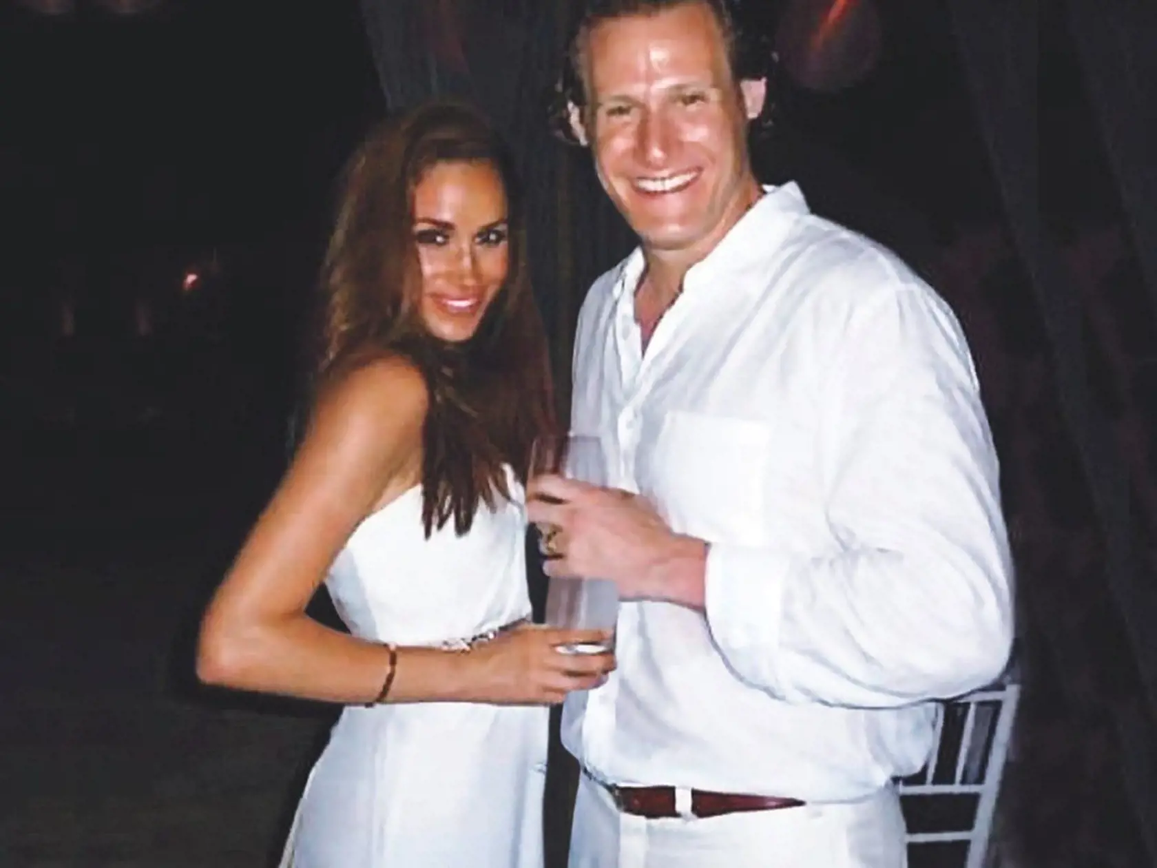 Meghan so svojím vtedajším manželom Trevorom, s ktorým boli svoji v rokoch 2011 až 2013.
