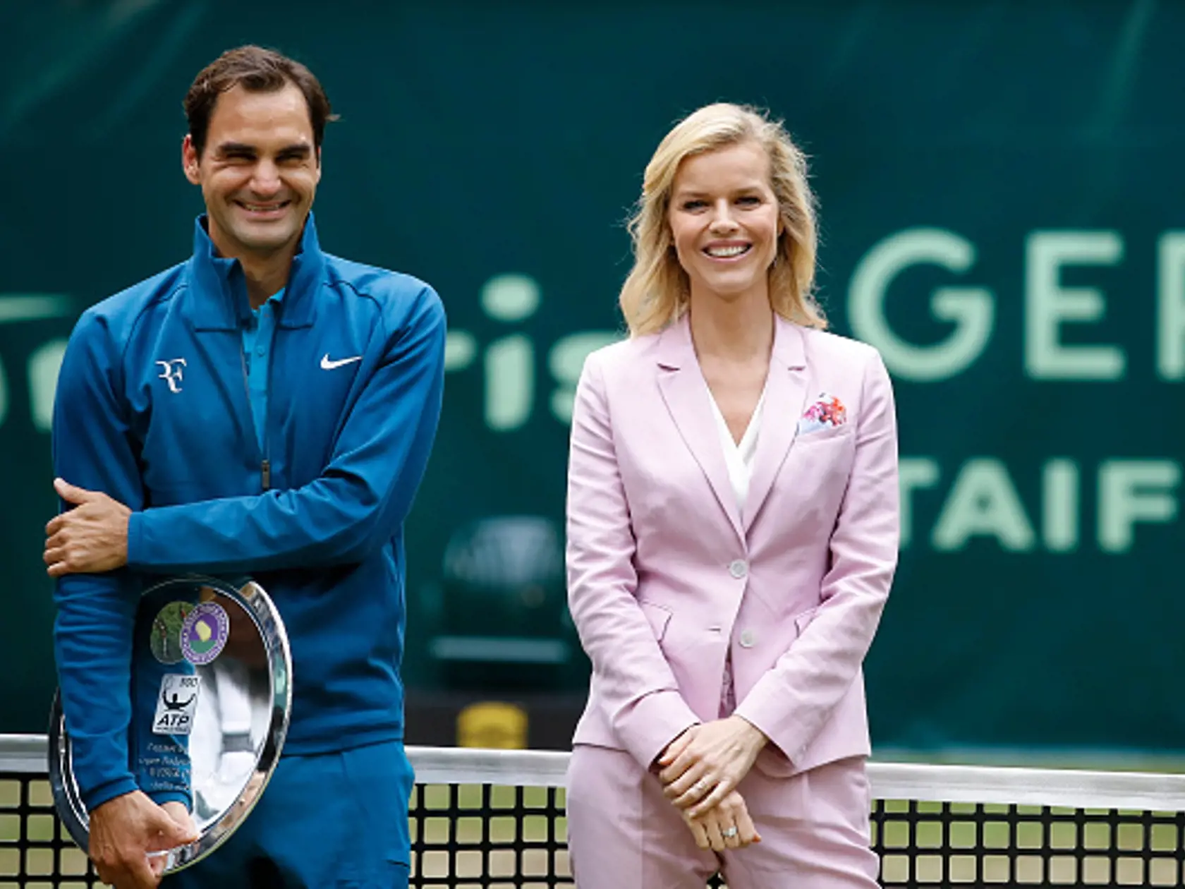 HALLE, GERMANY - JUNE 24: Tennis player Roger Federer and Gerry Weber testimonial international supermodel Eva Herzigova smile during the Gerry Weber Open 2018 at Gerry Weber Stadium on June 24, 2018 in Halle, Germany. (Photo by Franziska Krug/Getty Images for Gerry Weber)