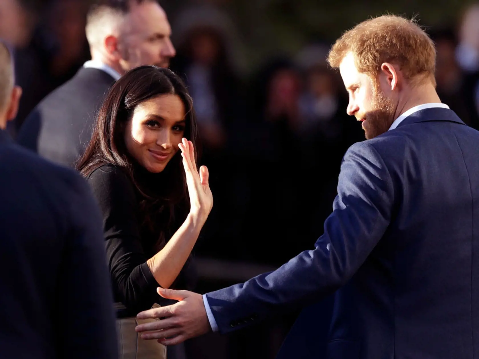 NOTTINGHAM, ENGLAND - DECEMBER 01:  Prince Harry and his fiancee US actress Meghan Markle leave after watching a hip hop opera performed by young people involved in the Full Effect programme at the Nottingham Academy school on December 1, 2017 in Nottingham, England.  Prince Harry and Meghan Markle announced their engagement on Monday 27th November 2017 and will marry at St George's Chapel, Windsor in May 2018.  (Photo by Matt Dunham - WPA Pool/Getty Images)