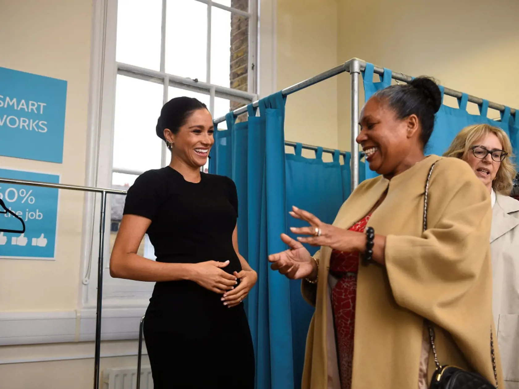 LONDON, ENGLAND - JANUARY 10: Meghan, Duchess of Sussex chats with Patsy Wardally during her visit to Smart Works on January 10, 2019 in London, United Kingdom. Smart Works is one of the four organisations which she has become Royal Patron of it was announced today by Kensington Palace. The three other organisations are The National Theatre, The Association of Commonwealth Universities (ACU) and Mayhew. (Photo by Clodagh Kilcoyne - WPA Pool/Getty Images)