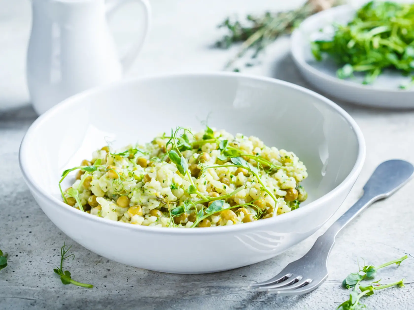 Green,Risotto,With,Broccoli,,Green,Peas,And,Sprouts,In,A