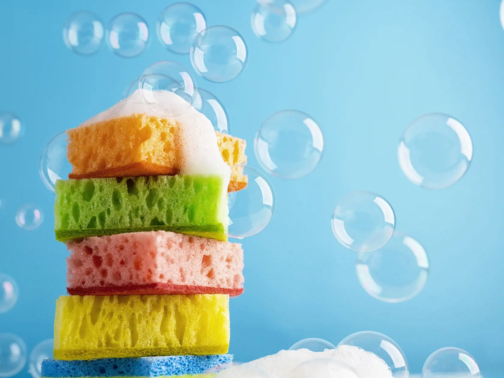 Household,Cleaning,Scrub,Colored,Sponges,With,Soap,Foam,And,Bubbles.