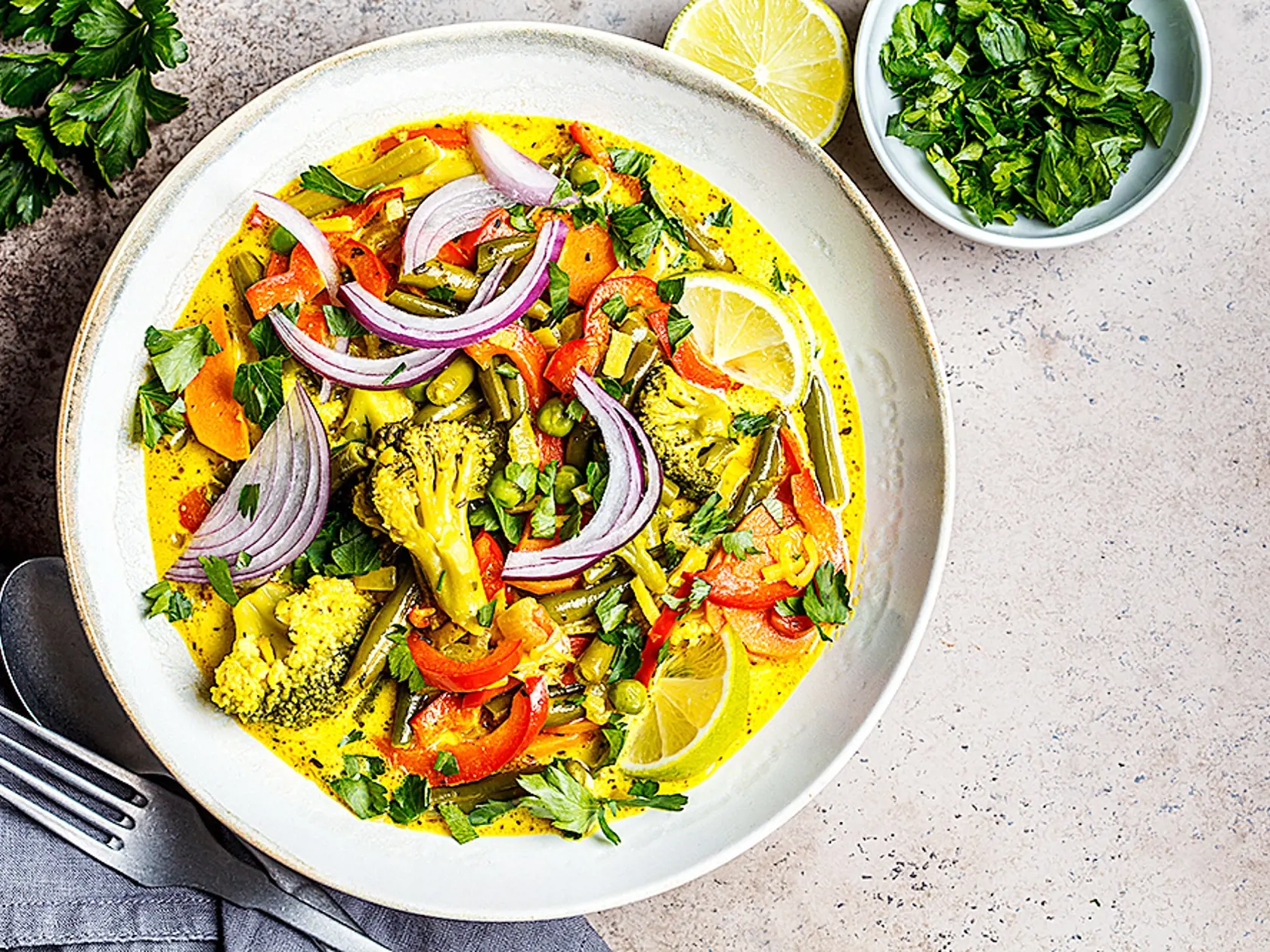 Vegetarian curry with vegetables and coconut milk in a bowl.