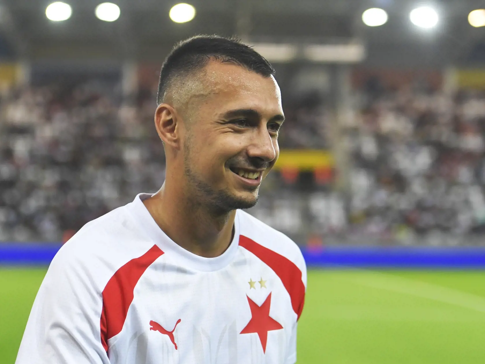 Na snímke slovenský futbalista v drese Slavie Praha Ivan Schranz sa usmieva v odvetnom zápase 3. predkola Európskej ligy UEFA SC Dnipro1 - SK Slavia Praha v Košiciach 17. augusta 2023. FOTO TASR – František Iván
