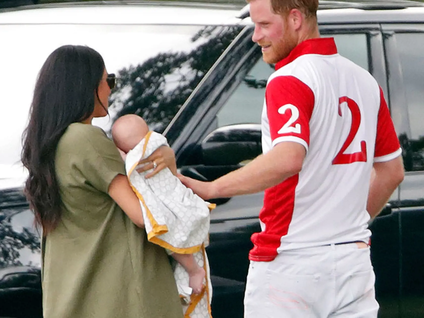 WOKINGHAM, UNITED KINGDOM - JULY 10: (EMBARGOED FOR PUBLICATION IN UK NEWSPAPERS UNTIL 24 HOURS AFTER CREATE DATE AND TIME) Meghan, Duchess of Sussex, Archie Harrison Mountbatten-Windsor and Prince Harry, Duke of Sussex attend the King Power Royal Charity Polo Match, in which Prince William, Duke of Cambridge and Prince Harry, Duke of Sussex were competing for the Khun Vichai Srivaddhanaprabha Memorial Polo Trophy at Billingbear Polo Club on July 10, 2019 in Wokingham, England. (Photo by Max Mum