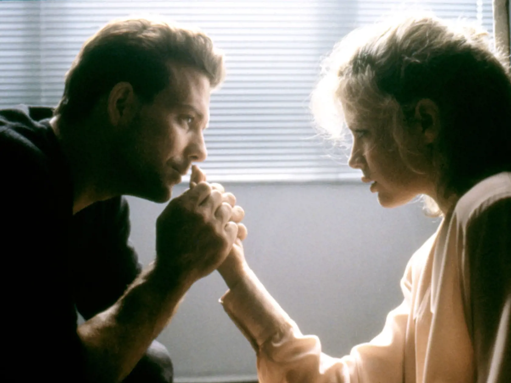 Mickey Rourke a Kim Basinger vo filme 9 a 1/2 týždňa.
