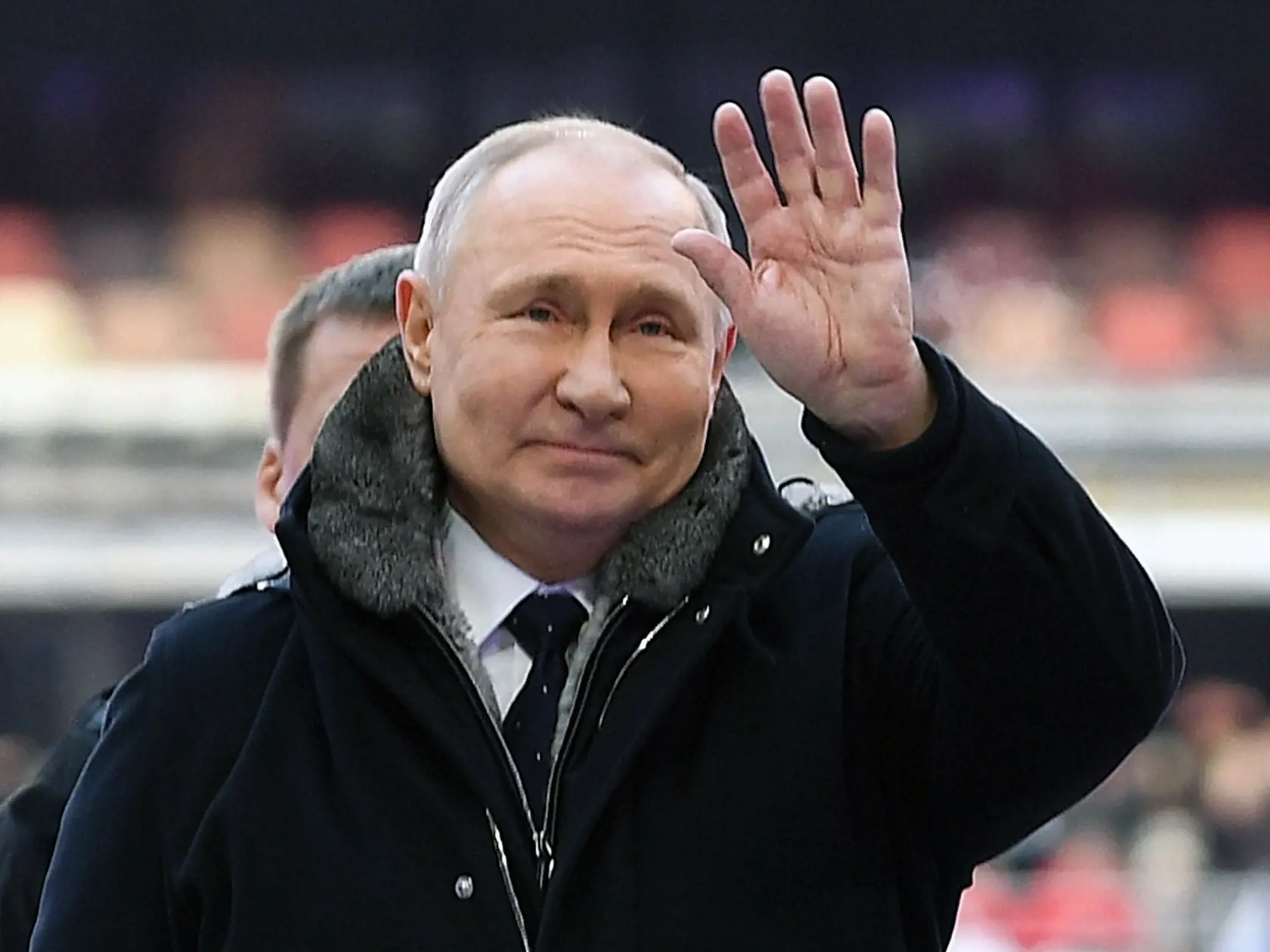 EBE 29 Moskva - Na snímke ruský prezident Vladimir Putin prichádza na koncert Sláva obrancom vlasti deň pred štátnym sviatkom Dňa obrancov vlasti na počesť ruských ozbrojených síl na štadióne v Lužnikách v Moskve 22. februára 2023. Putin v stredu vyhlásil, že Rusko bojuje na Ukrajine za svoje "historické územia". FOTO TASR/AP
 
Russian President Vladimir Putin gestures as he arrives to Luzhniki Stadium, the day before a concert will take place to celebrate the Defender of the Fatherland Day, a h