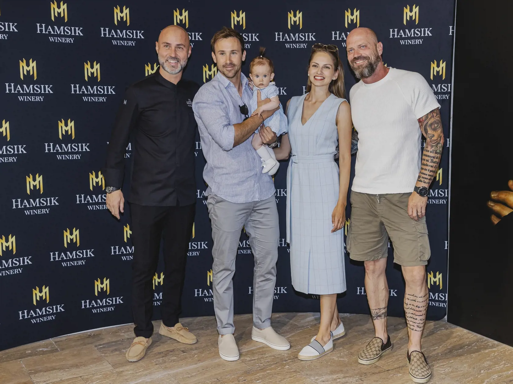 Na snímke Andrea Ena, Marek Fašiang s partnerkou Terezou Bízikovou a ich dcérou Olíviou a Dušan Hamšík počas otvorenia letnej sezóny v reštaurácií Di Andrea v Bratislave.