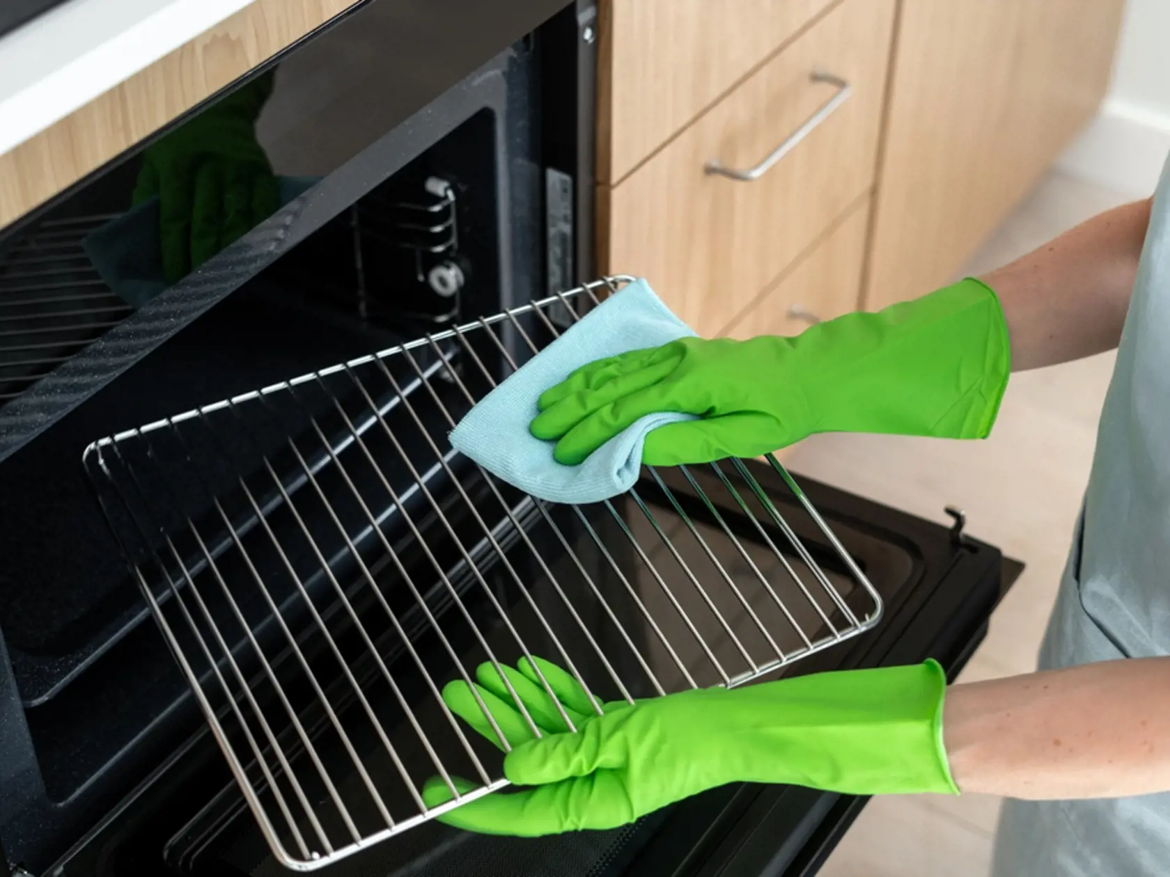 High,Angle,View,Of,Woman,In,Rubber,Gloves,Cleans,The