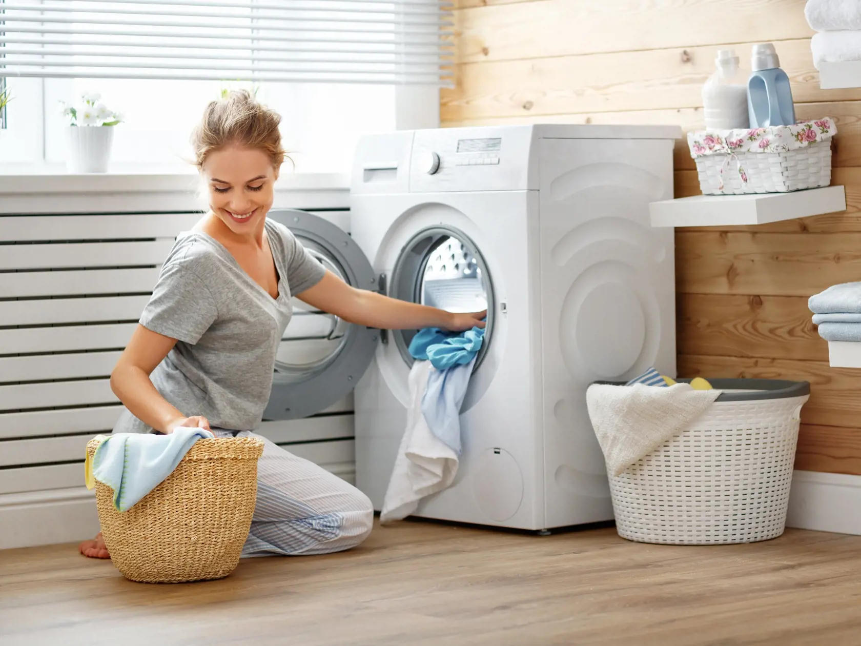 A,Happy,Housewife,Woman,In,Laundry,Room,With,Washing,Machine