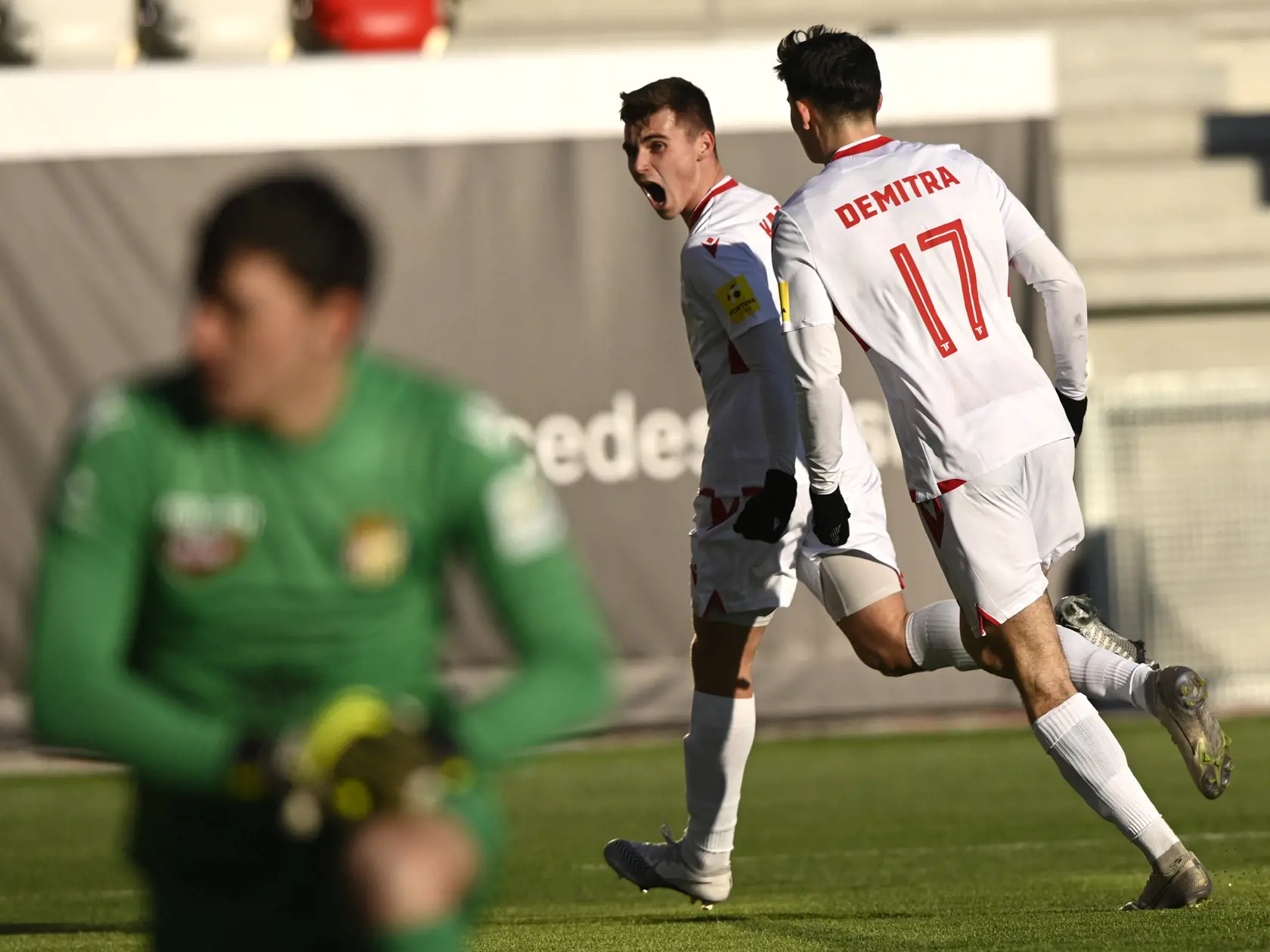 Na snímke zľava prekonaný brankár Martin Jedlička (FK DAC 1904 Dunajská Streda) a radujúci sa futbalisti Trenčína Jakub Kadák a Lucas Demitra počas zápasu 19. kola Fortuna ligy AS Trenčín - FK DAC 1904 Dunajská Streda, 14. februára 2021 v Trenčíne. FOTO TASR - Radovan Stoklasa