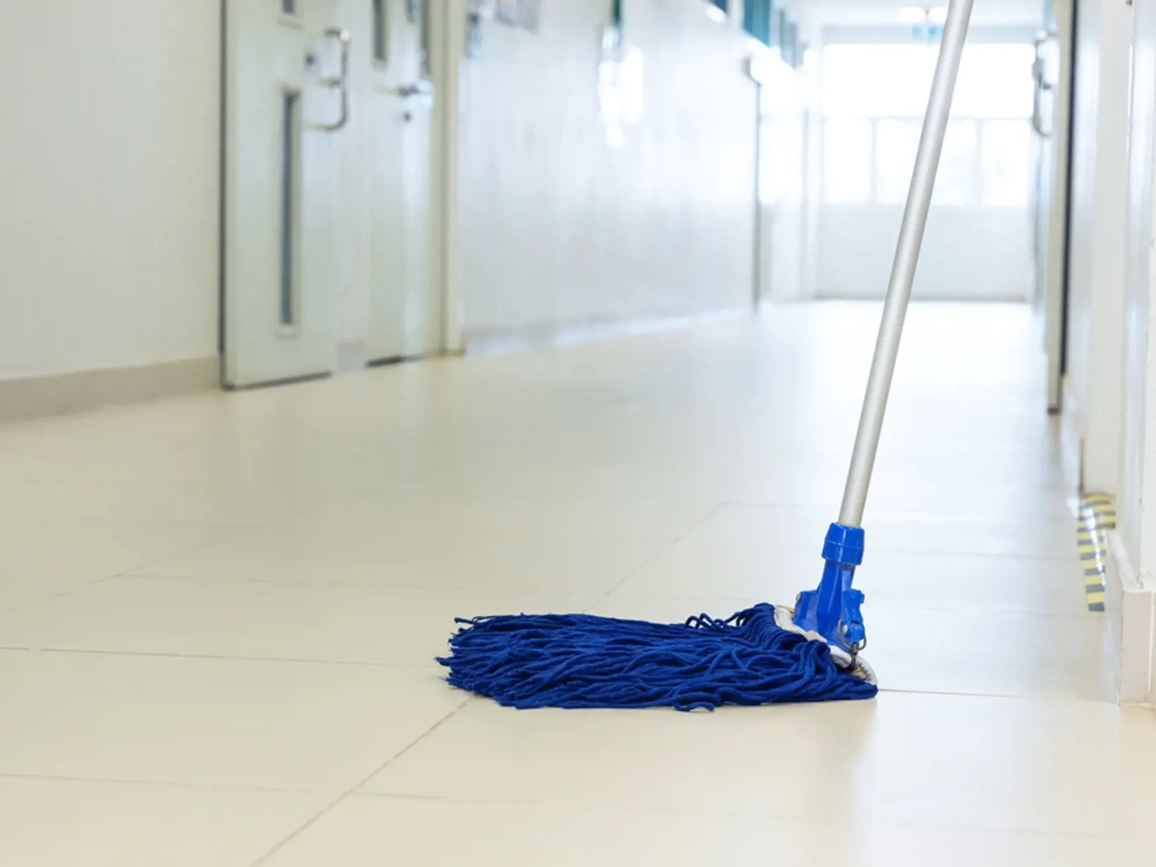 Mop,On,The,Floor,In,Hallway,Office,Building,Or,Corridor