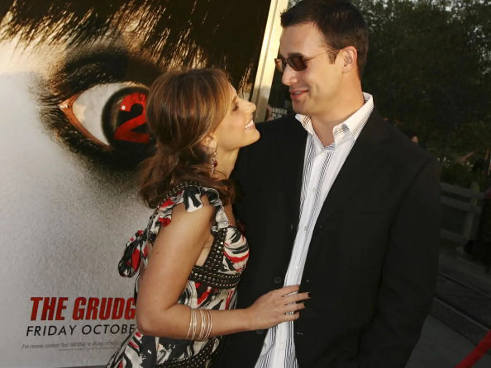 BUENA PARK, CA - OCTOBER 8:  Actors Sarah Michelle Gellar (L) and husband Freddie Prinze, Jr. arrive at the premiere of Columbia Pictures' "The Grudge 2" at Knott's Scary Farm on October 8, 2006 in Buena Park, California. (Photo by Kevin Winter/Getty Images)