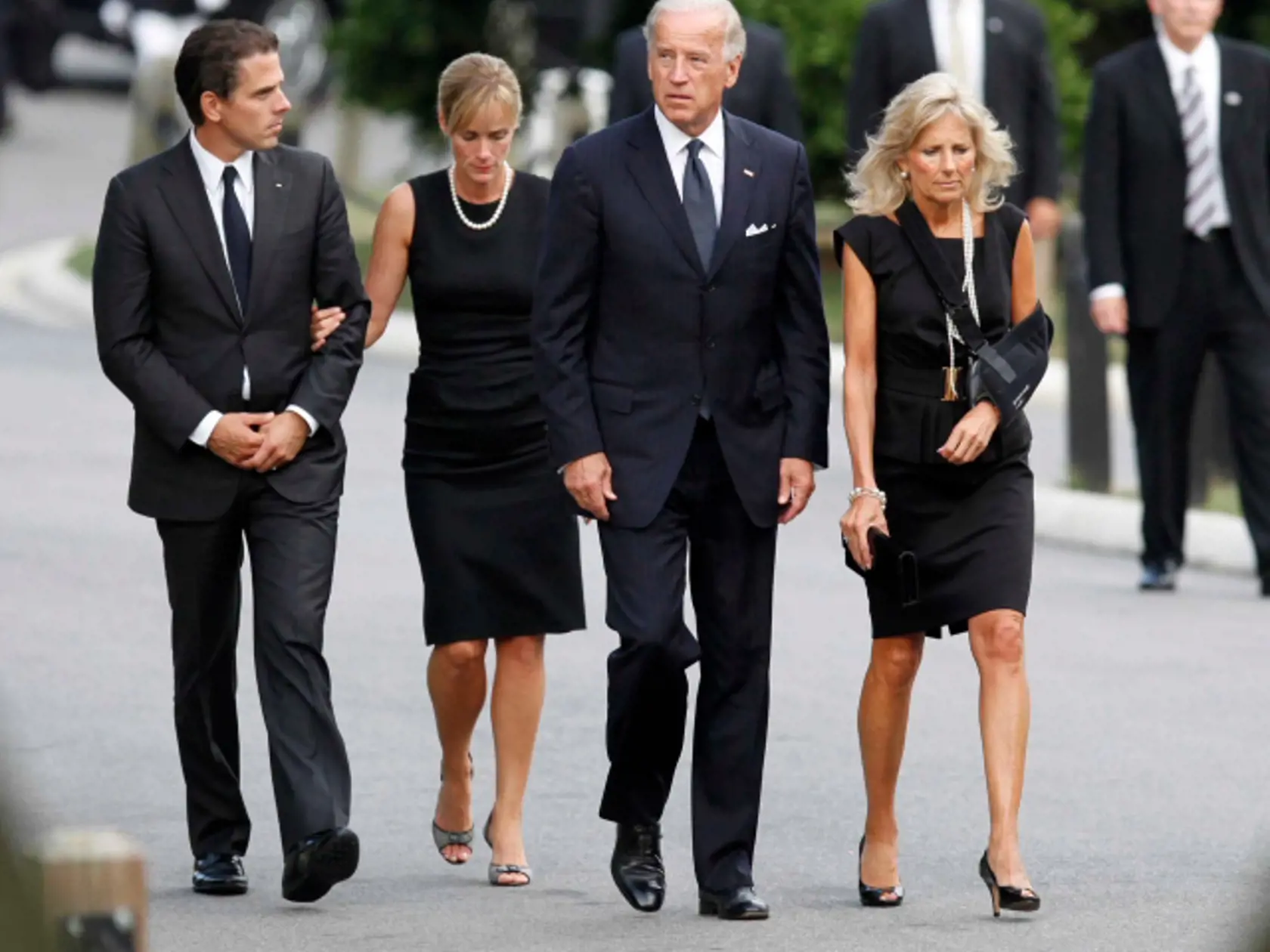 MSG: U.S. Vice President Joe Biden (2nd from R) arrives at Arlington National Cemetery with his wife Dr. Jill Biden (R), his son Hunter (L) and his daughter-in-law Kathleen for the internment services for U.S. Senator Edward Kennedy
during the burial service for U.S. Senator Edward Kennedy at Arlington National Cemetery in Arlington, Virginia, August 29, 2009. Kennedy died late Tuesday after a battle with cancer.