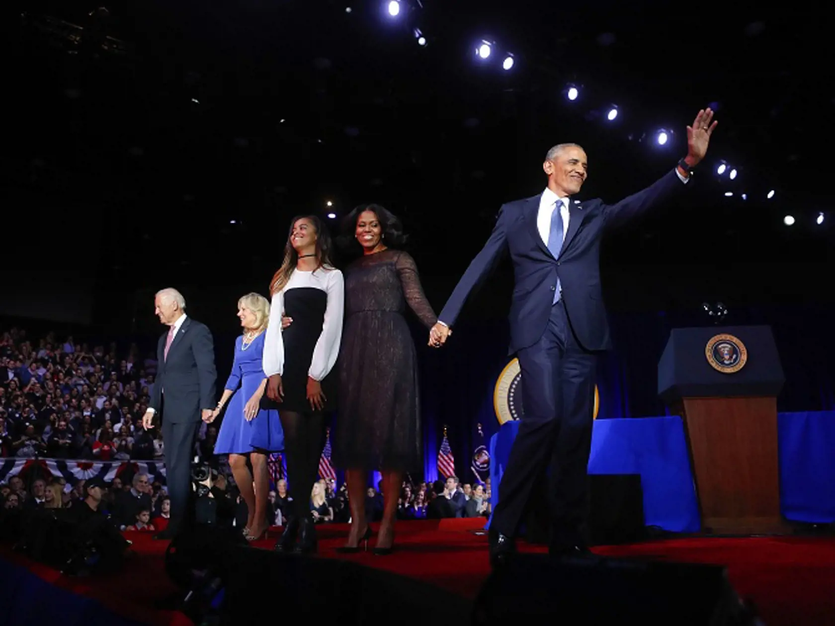 President Barack Obama waves on stage with first lady Michelle Obama, daughter Malia, Vice President Joe Biden and his wife Jill Biden after his farewell address at McCormick Place in Chicago, Tuesday, Jan. 10, 2017. (AP Photo/Pablo Martinez Monsivais)