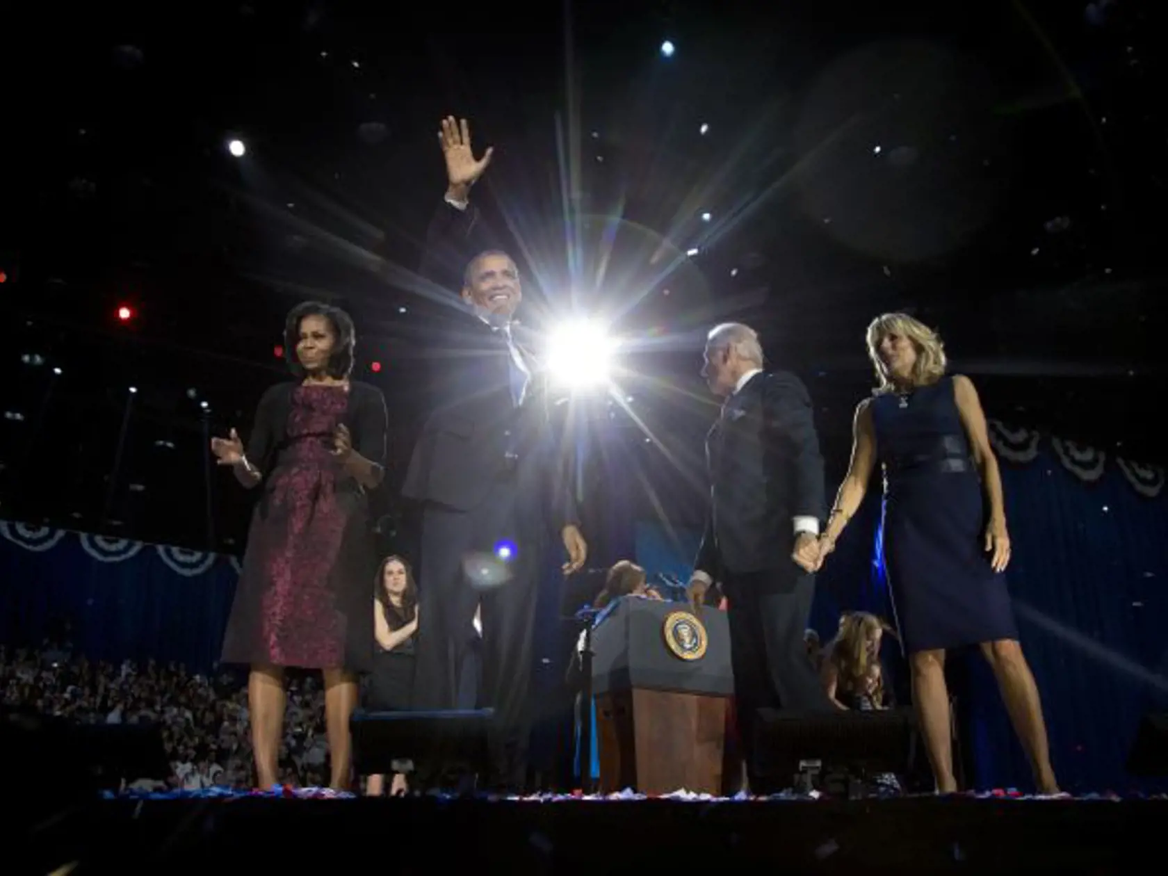 President Barack Obama with first last Michelle Obama, Vice President Joe Biden and Jill Biden celebrate on stage at the election night party at McCormick Place, Wednesday, Nov. 7, 2012, in Chicago. Obama defeated Republican challenger former Massachusetts Gov. Mitt Romney. (AP Photo/Carolyn Kaster)